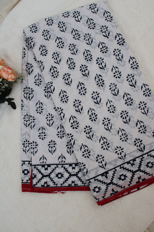 White hand block printed mul mul cotton with flower motifs