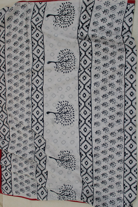 White hand block printed mul mul cotton with flower motifs
