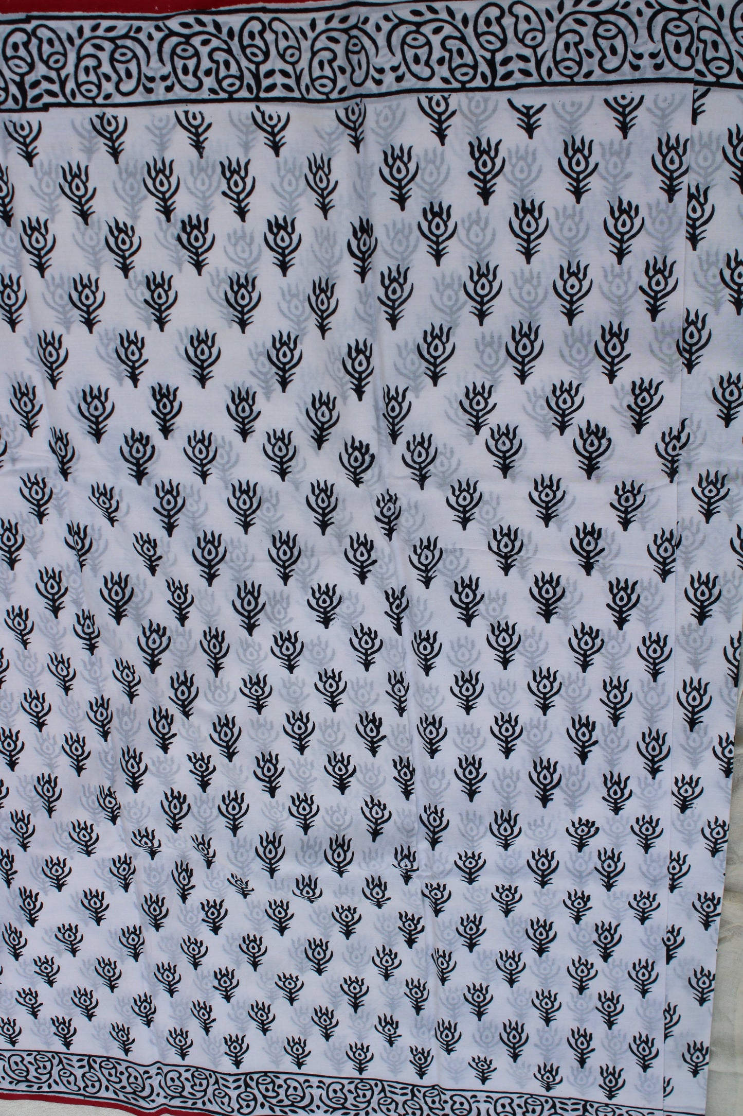 White hand block printed saree with peacock leaf design