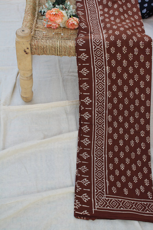 Brown with white block printed mul cotton saree