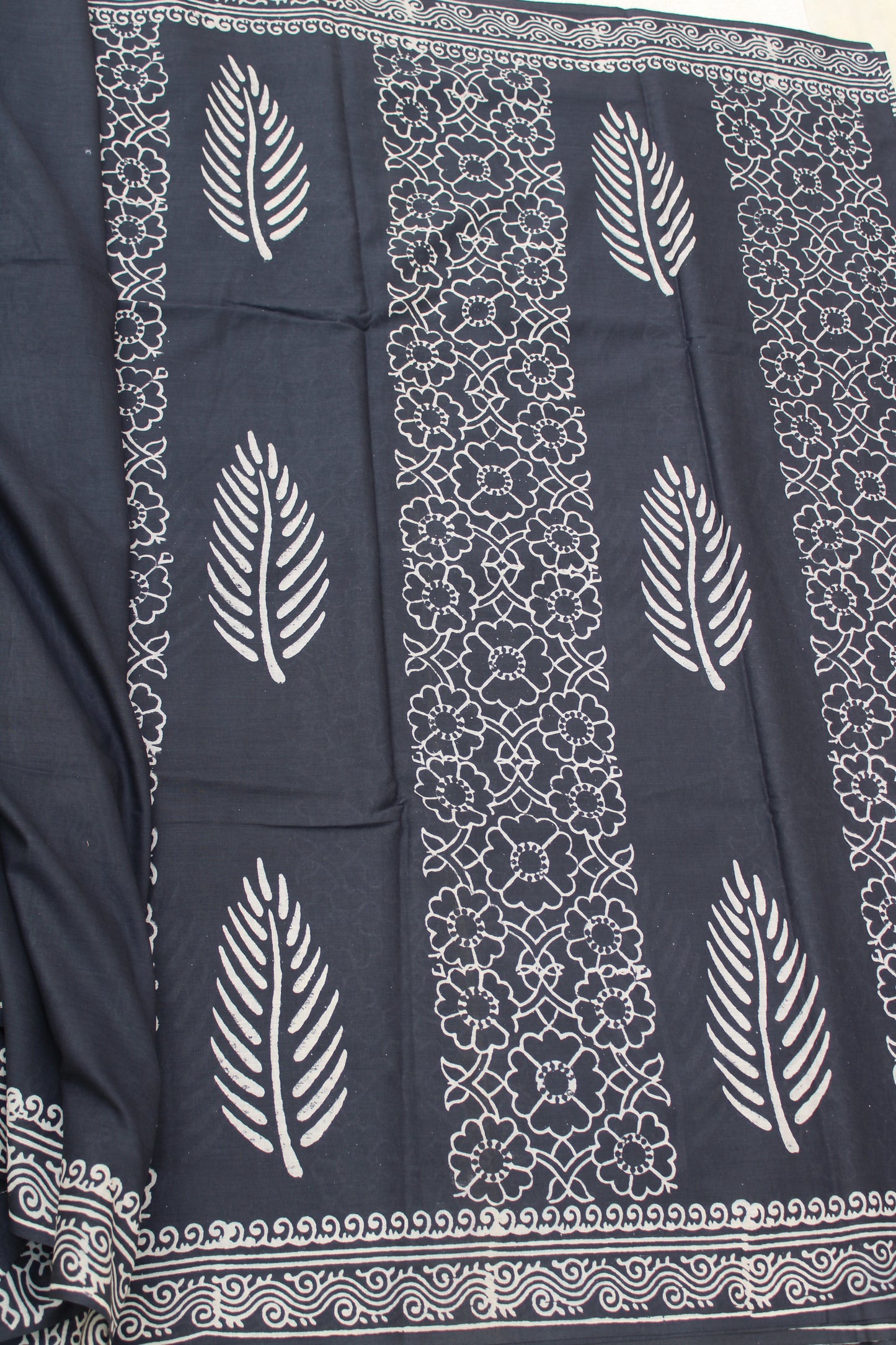 Grey with white leaf block printed mul cotton saree