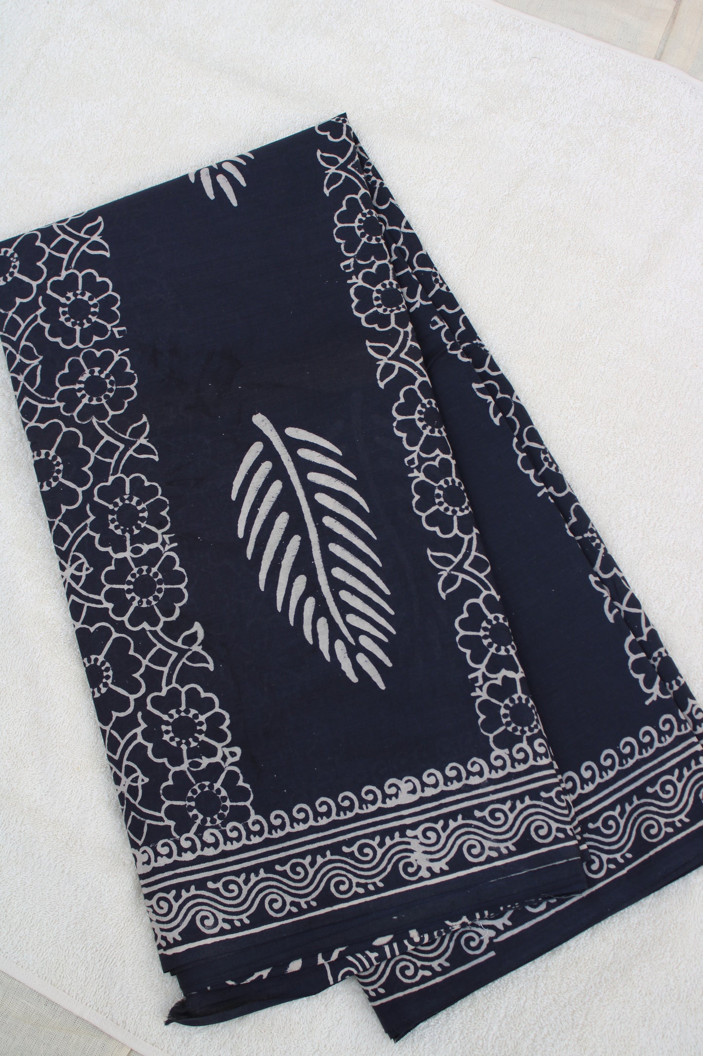 Grey with white leaf block printed mul cotton saree