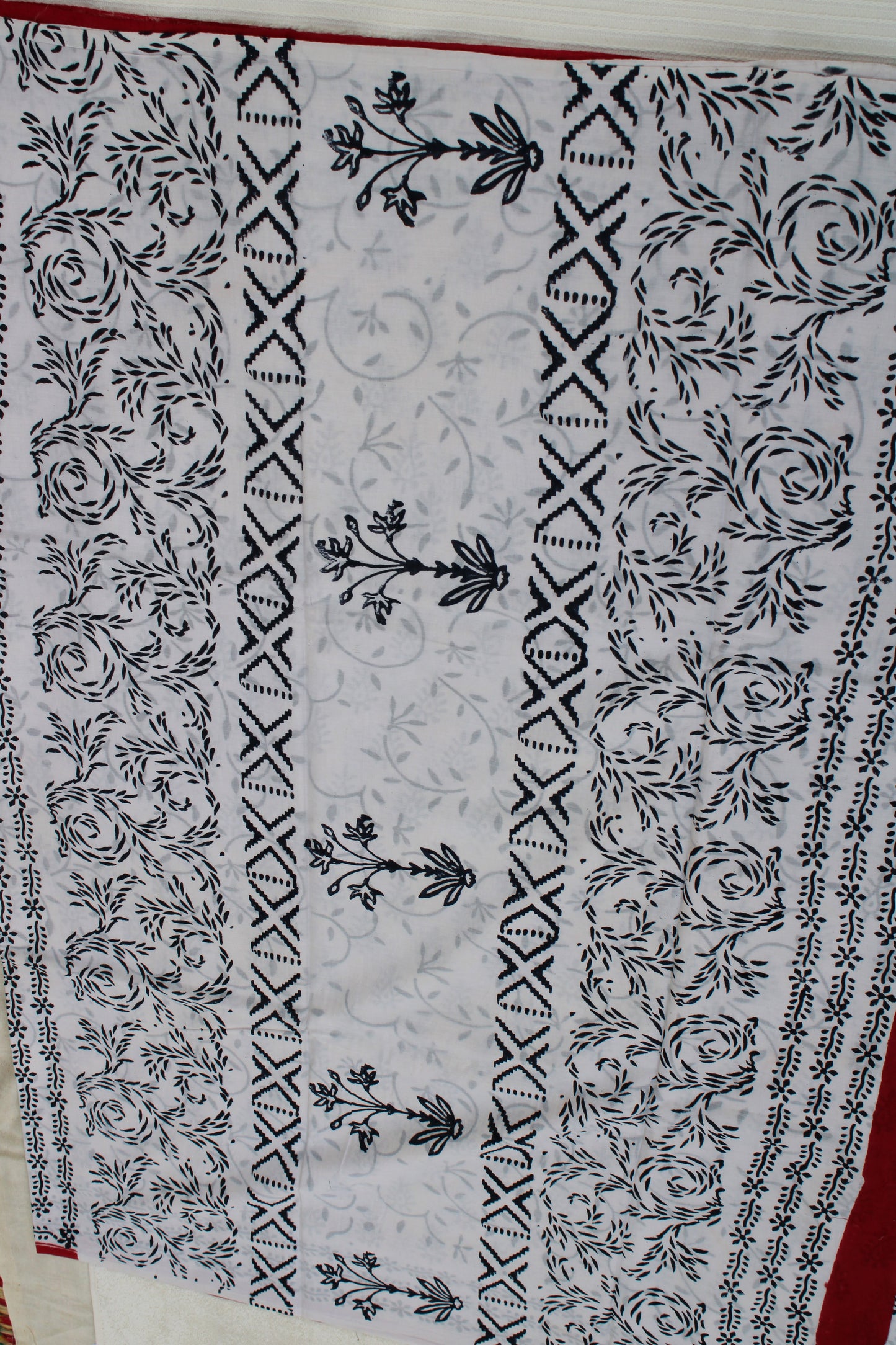 White with black peacock leaf hand block printed mul cotton saree