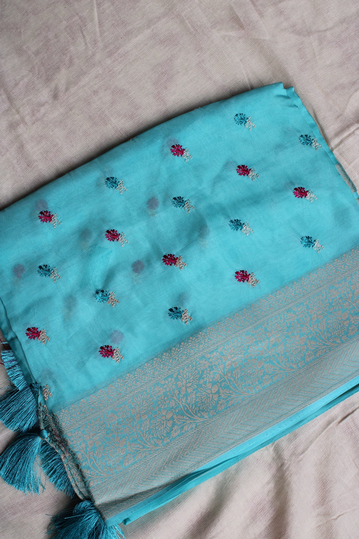 Light blue crapesilk Saree with flower embroidery design