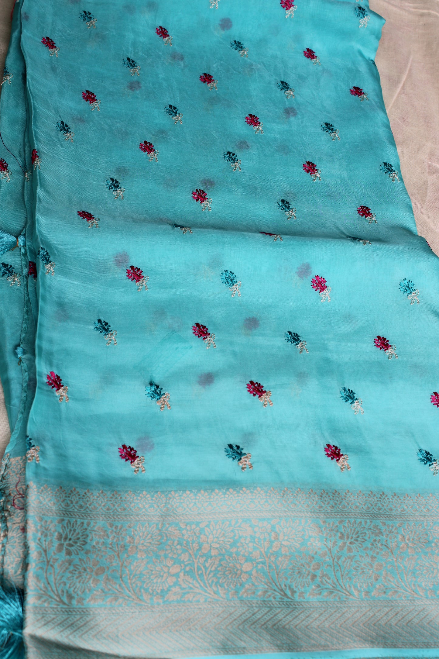 Light blue crapesilk Saree with flower embroidery design