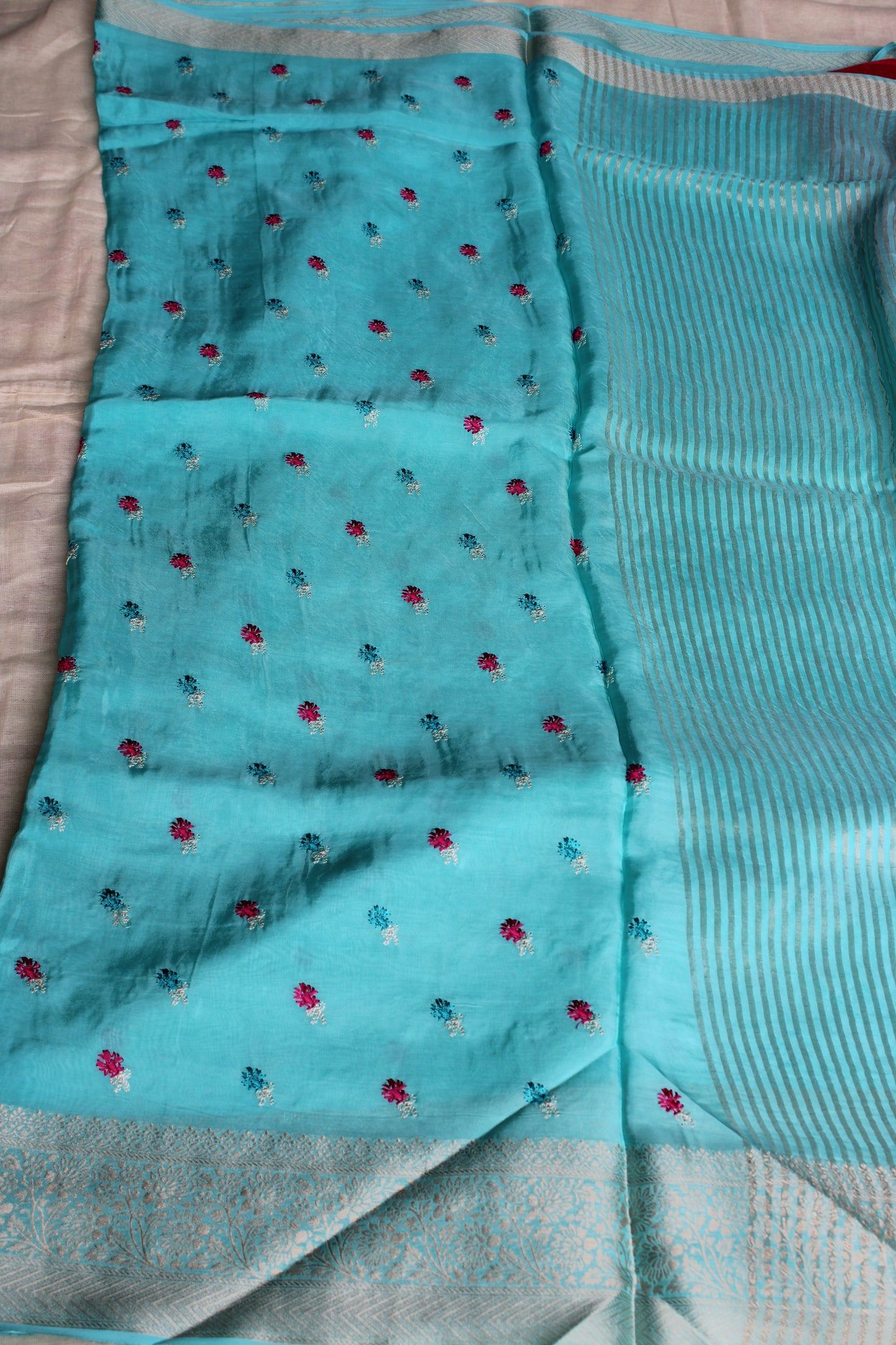 Light blue crapesilk Saree with flower embroidery design