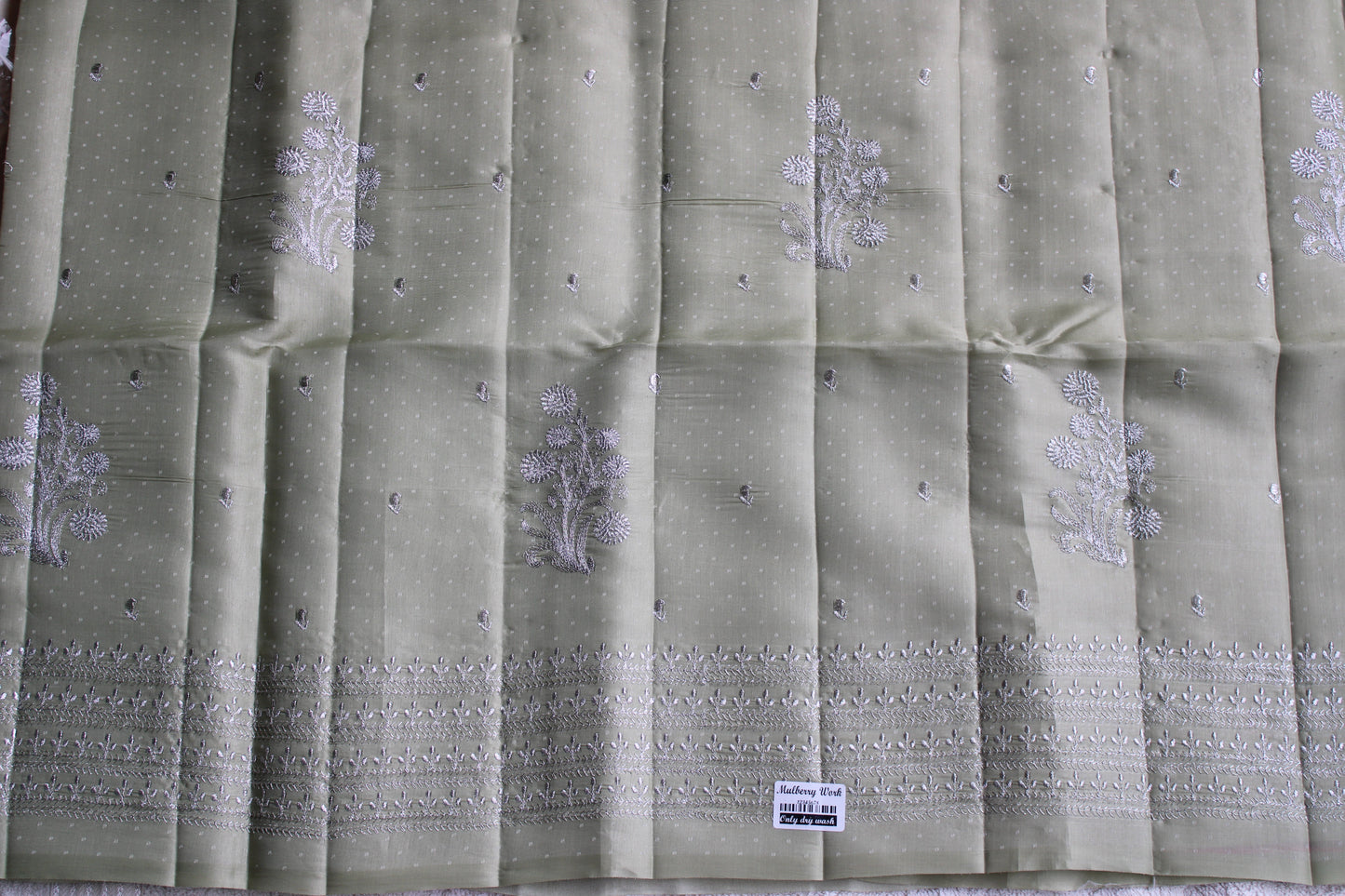 Green Dot Tusser saree with zari embroidery and contrast blouse