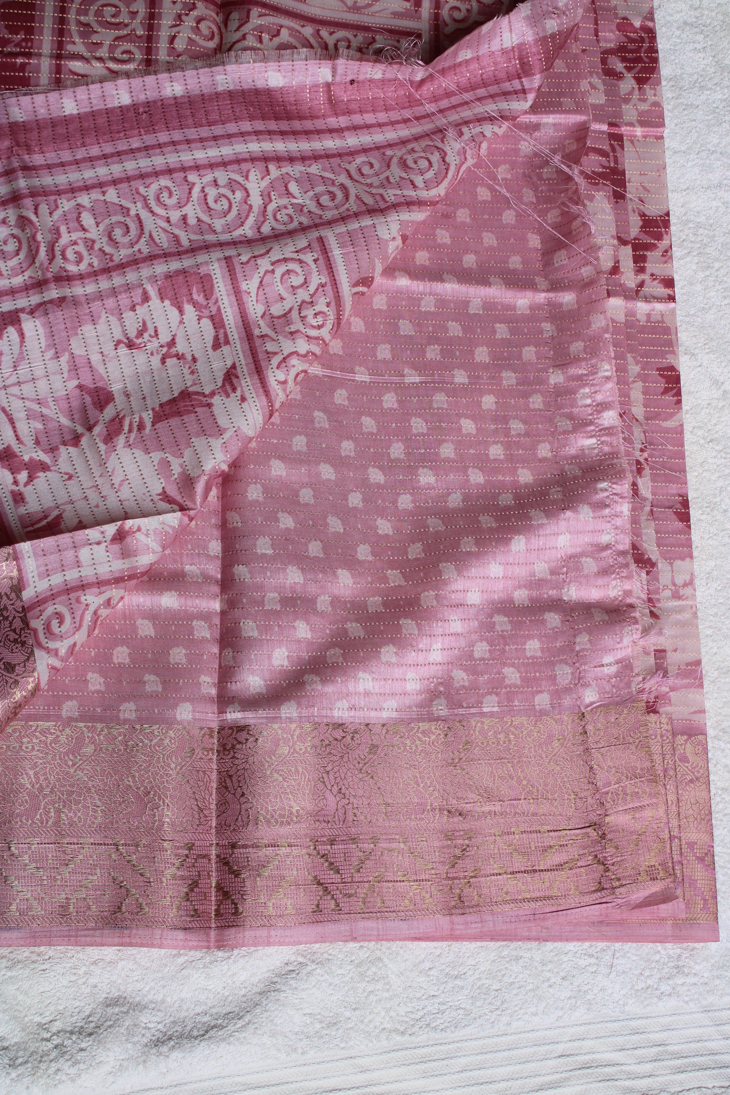 Pink tusser saree with zari horizantal lines and zare border