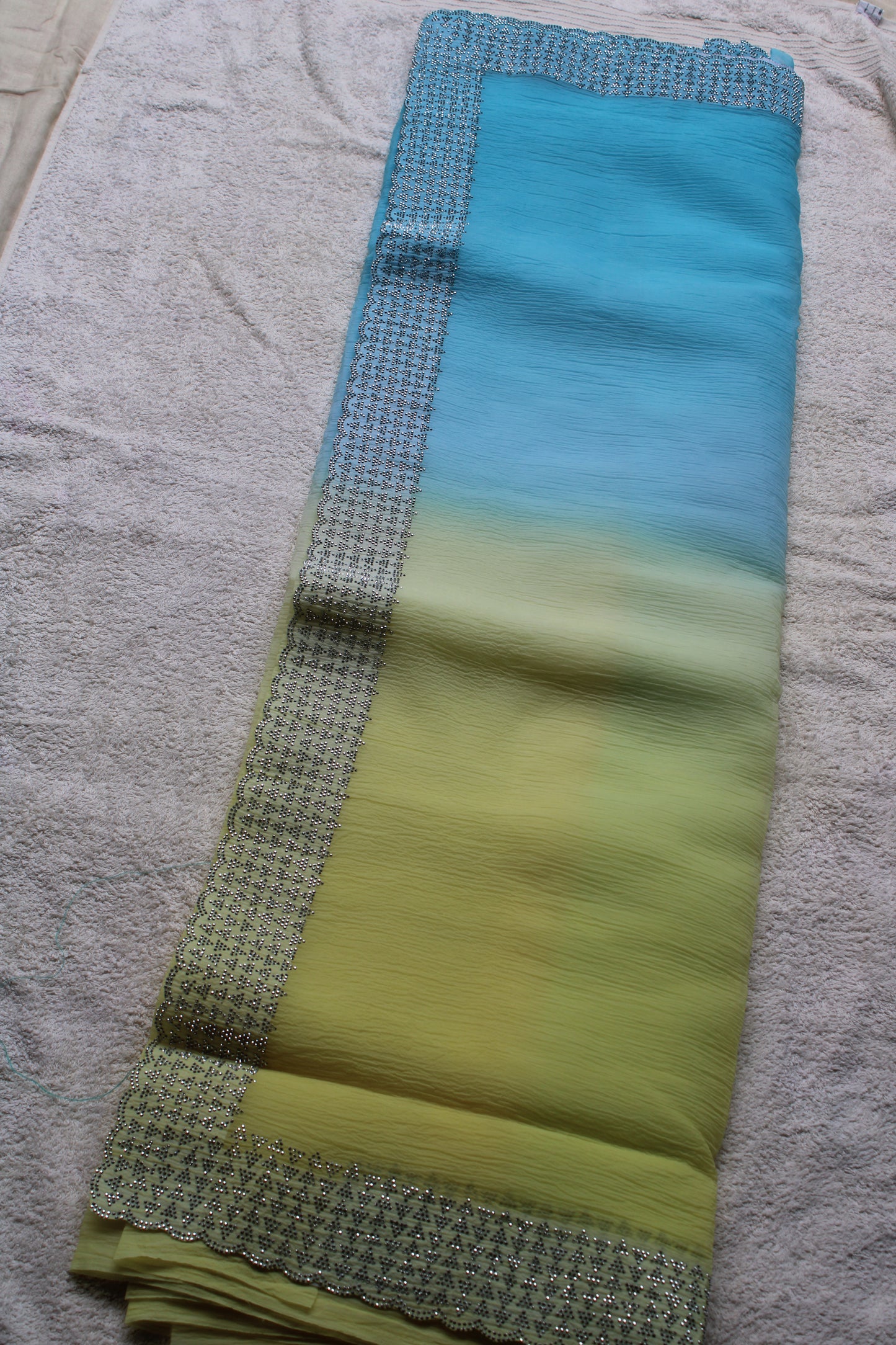 Blue and Yellow Crushed georgette shaded saree