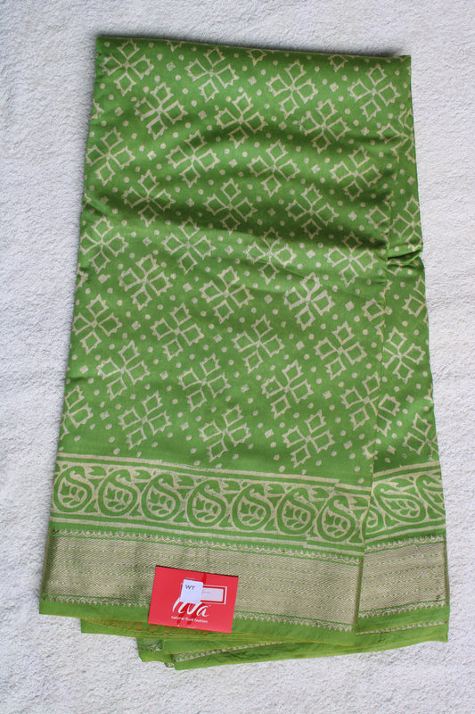 Green Maheshwari Art silk saree with block prints and zari border
