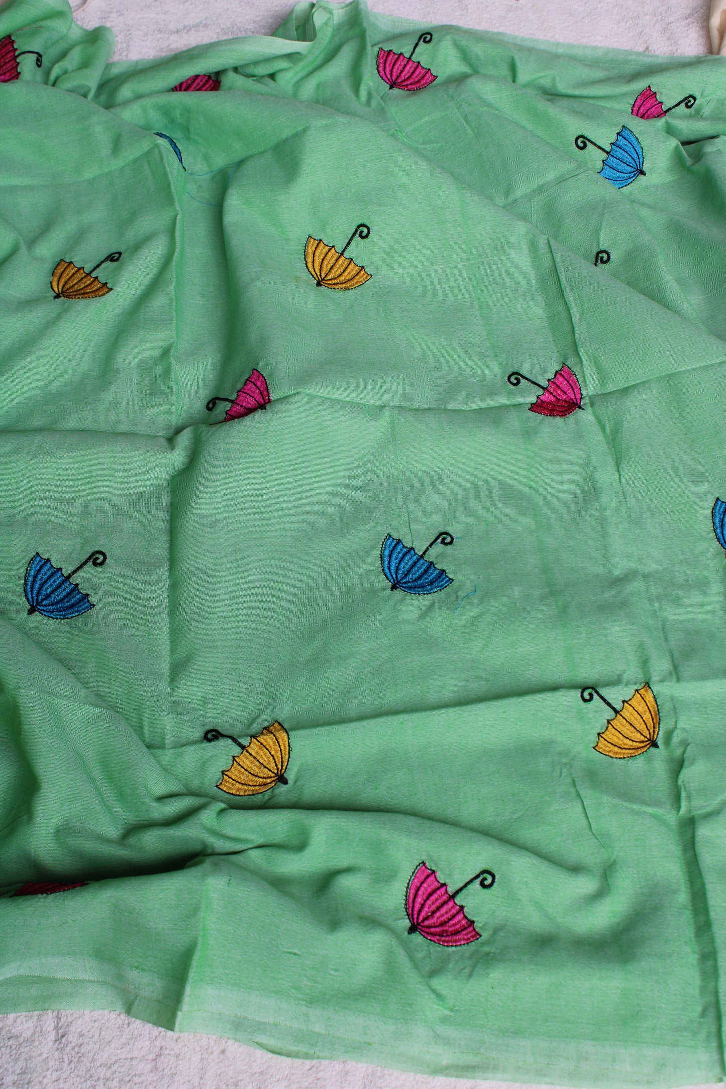 Green Kadhi cotton saree with unique umbrella Embroidery design