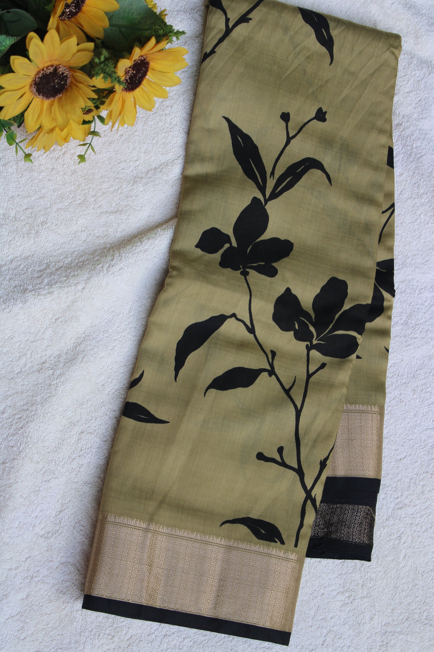Green Tussur Crape saree with floral design