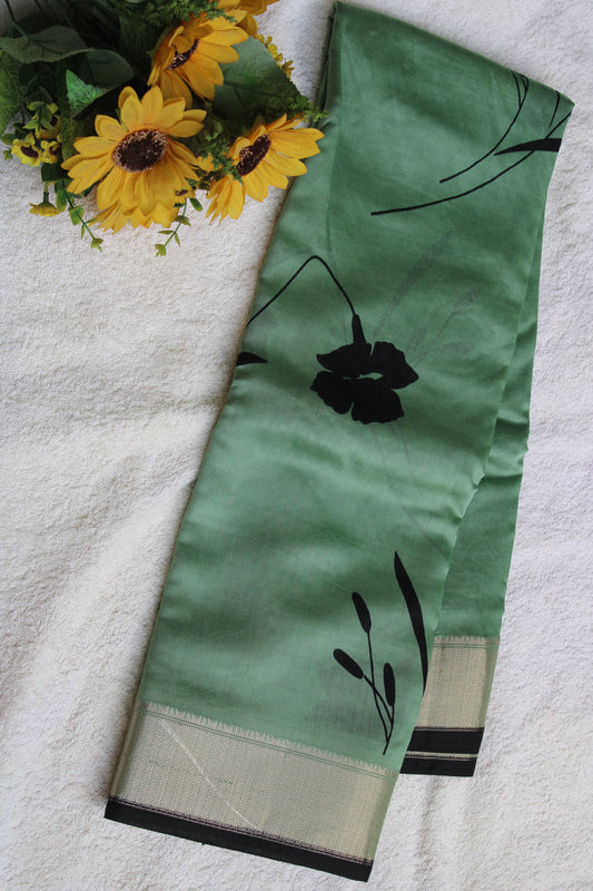 Green Tussur Crape saree with floral design