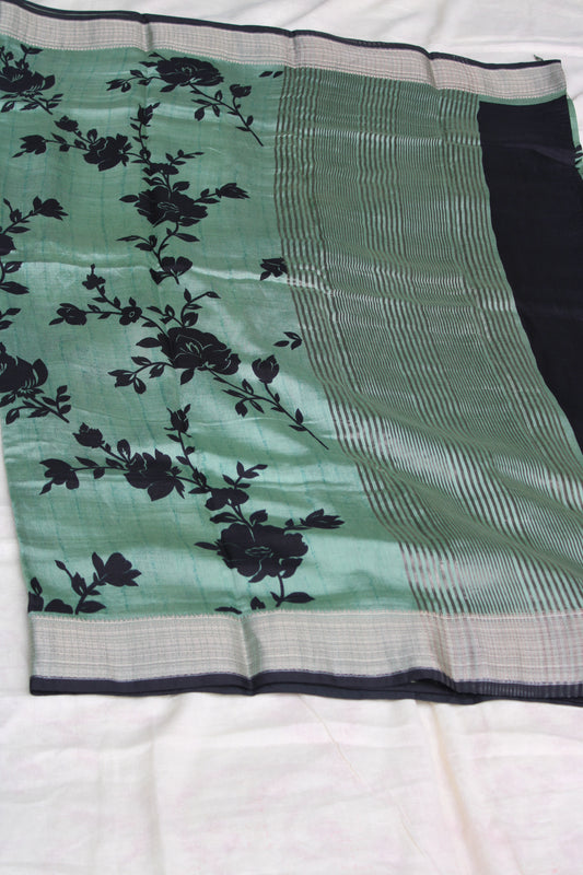 Green Tussur Crape saree with floral design