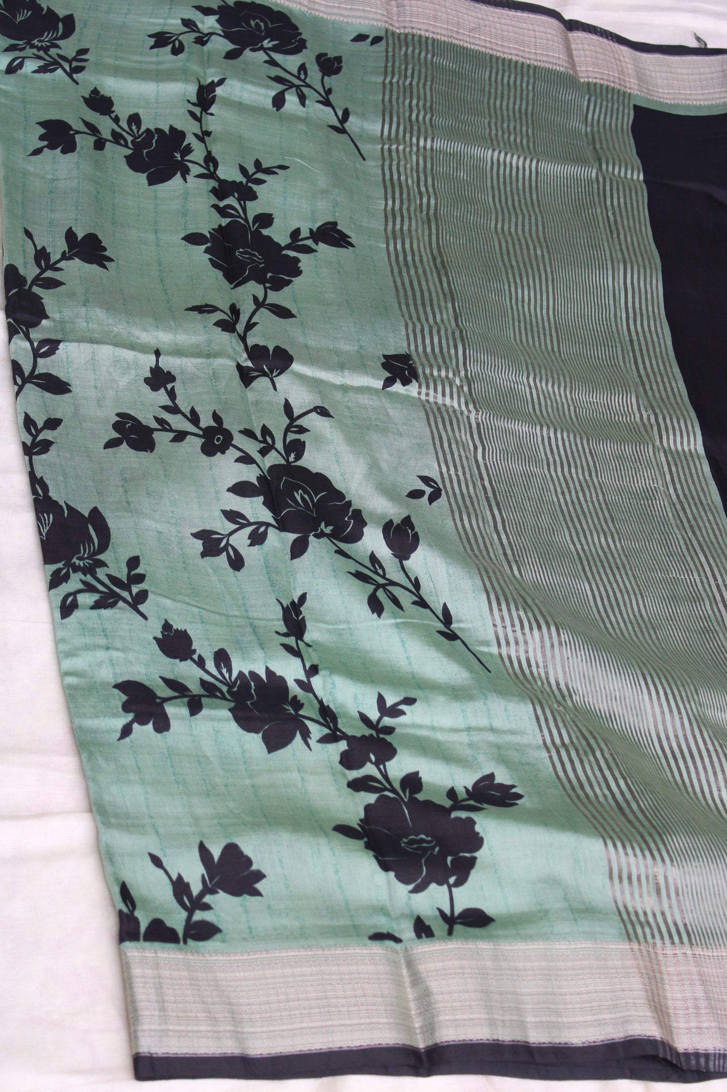 Green Tussur Crape saree with floral design