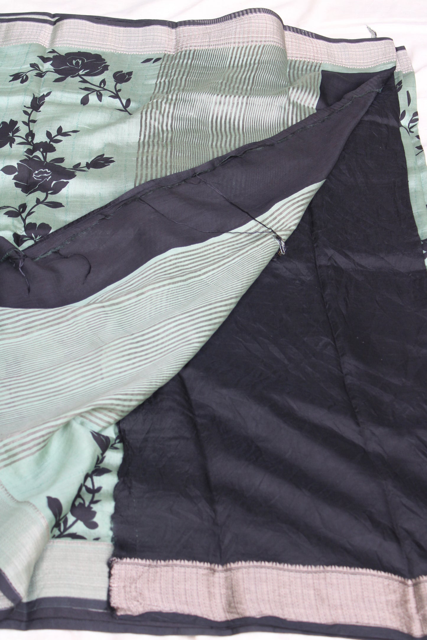 Green Tussur Crape saree with floral design