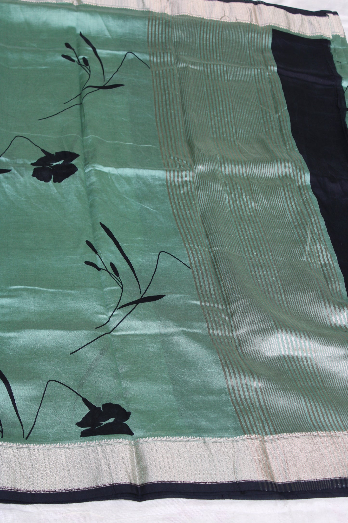 Green Tussur Crape saree with floral design