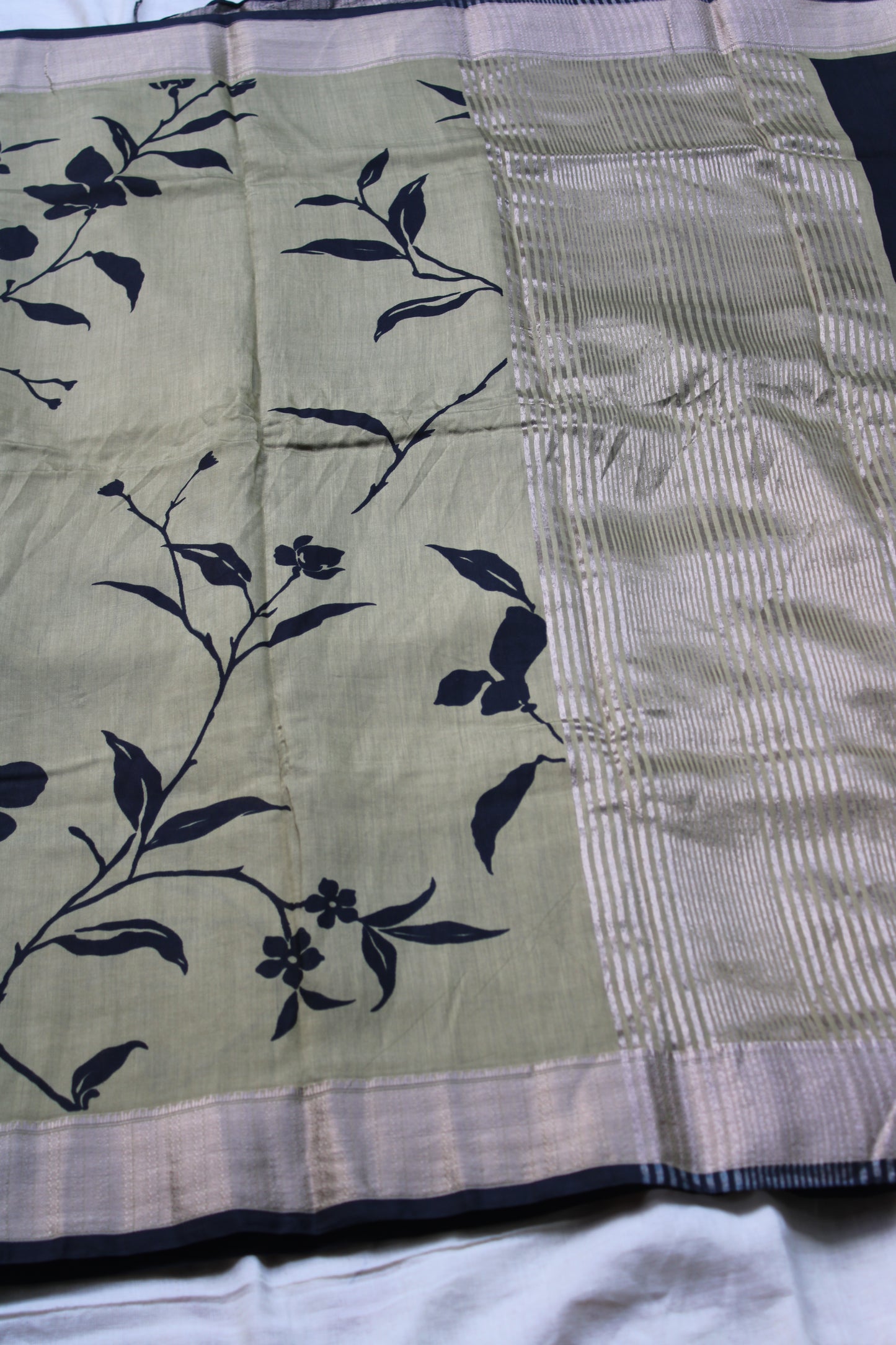 Green Tussur Crape saree with floral design