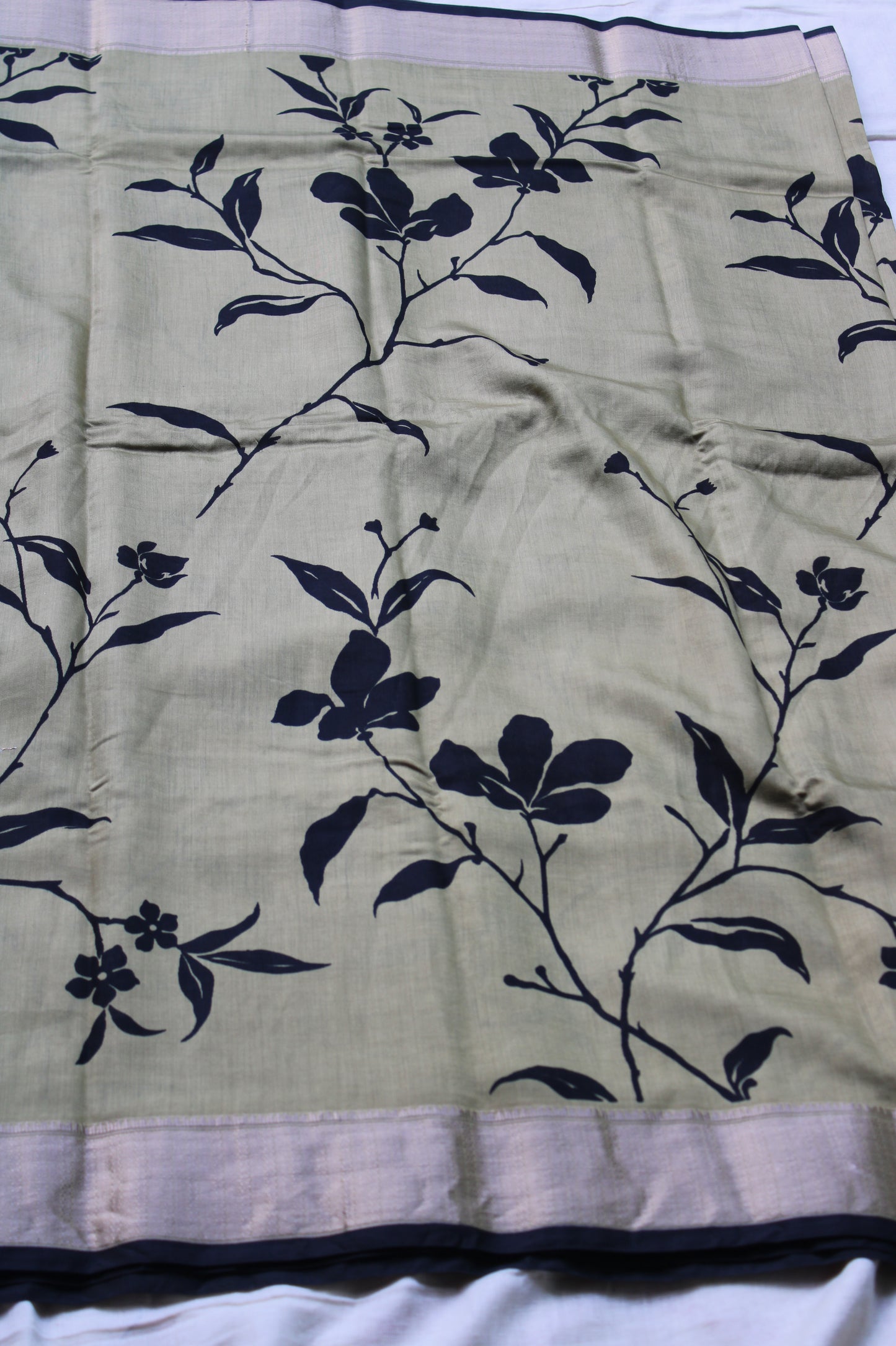 Green Tussur Crape saree with floral design