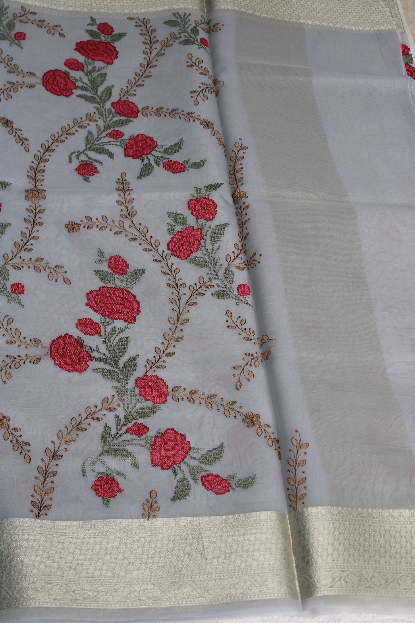 Light grey organza Parsi work saree with Zari border