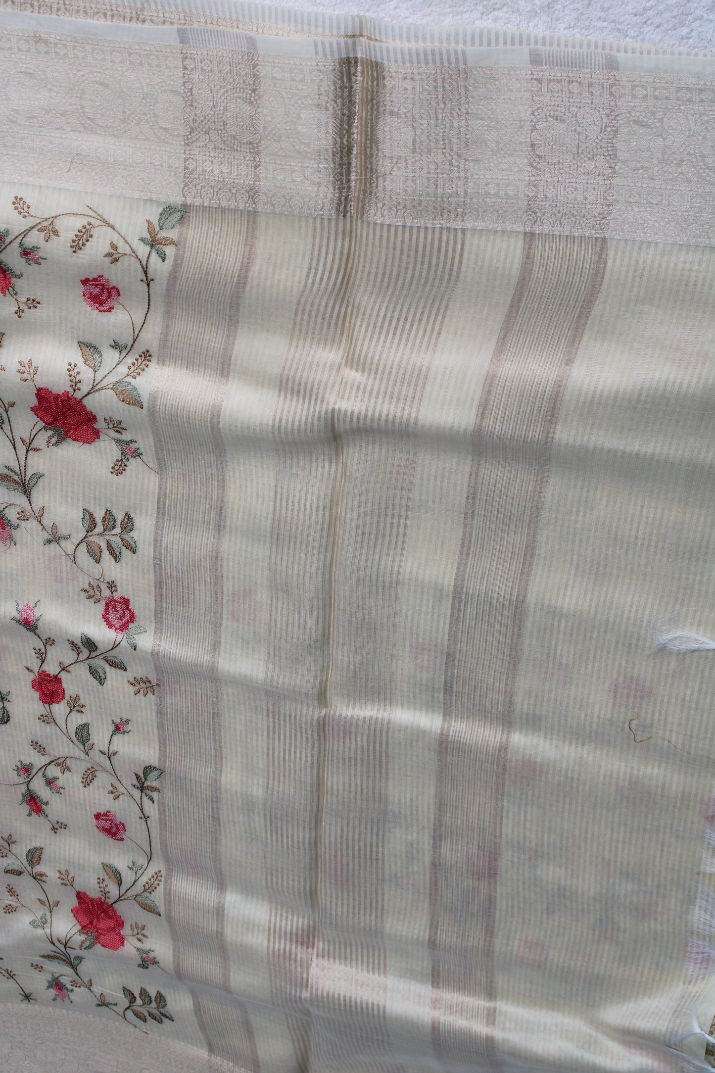 Beige Lenin silk saree with Banarasi parsi work and zari border