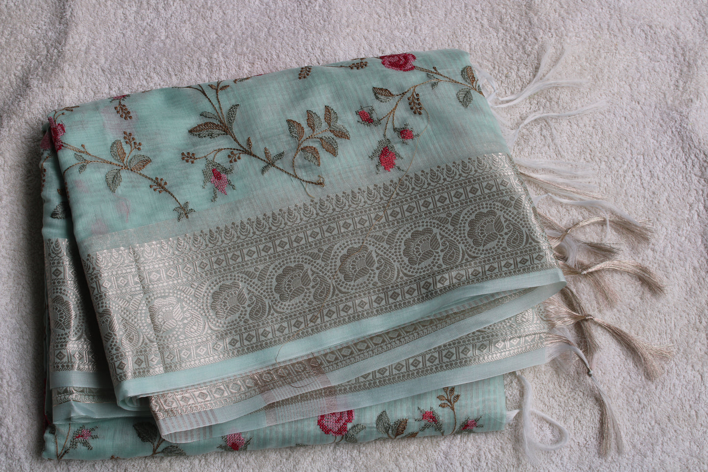 Pastel blue lenin silk saree with Banarasi parsi work and zari border