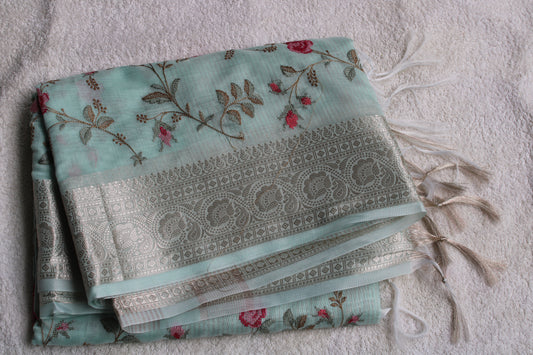 Pastel blue lenin silk saree with Banarasi parsi work and zari border
