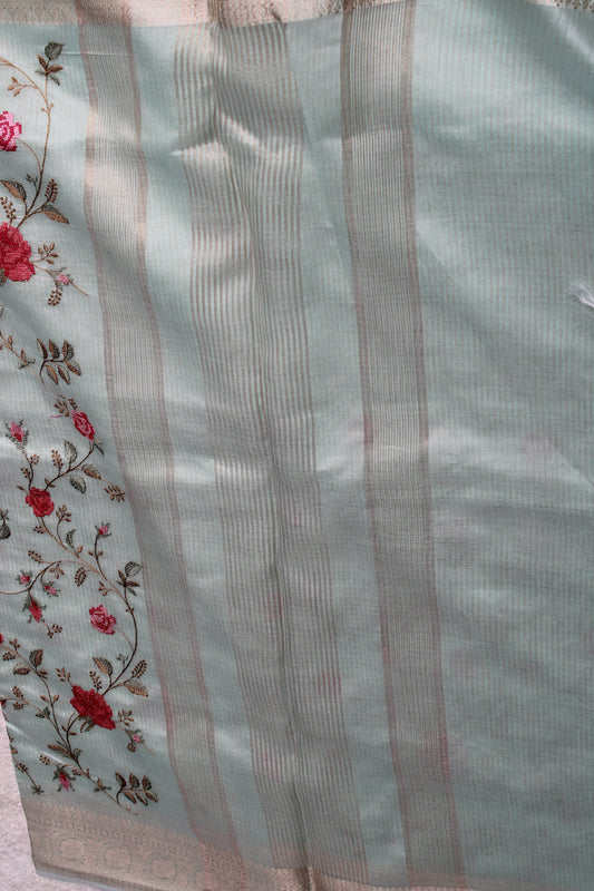 Pastel blue lenin silk saree with Banarasi parsi work and zari border