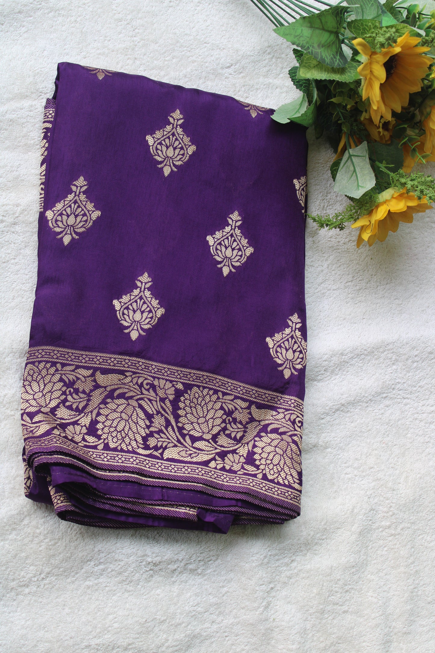 Banarasi purple saree with small trending border and new flower motifs