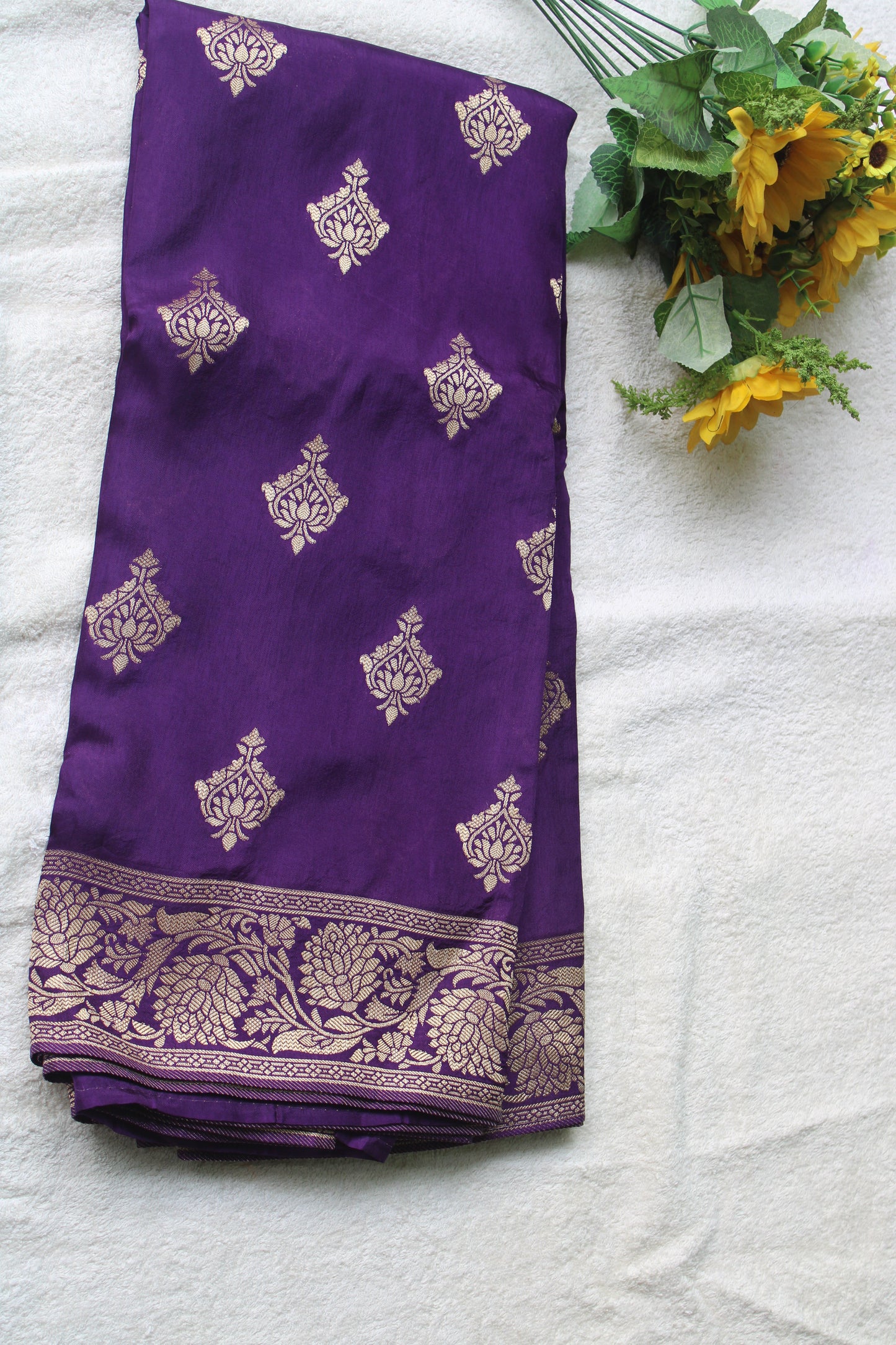 Banarasi purple saree with small trending border and new flower motifs