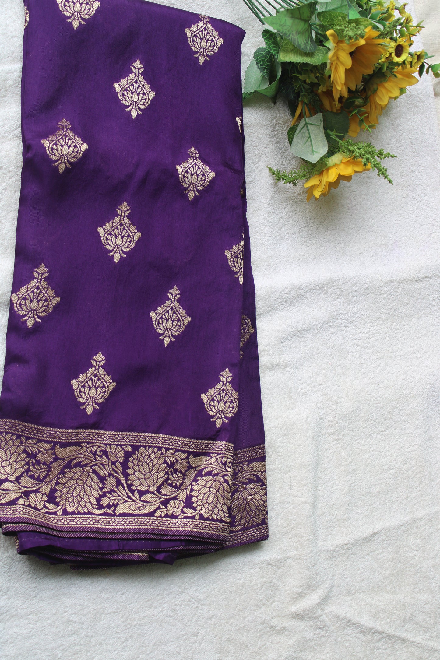 Banarasi purple saree with small trending border and new flower motifs