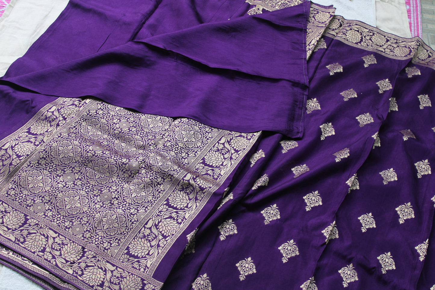 Banarasi purple saree with small trending border and new flower motifs