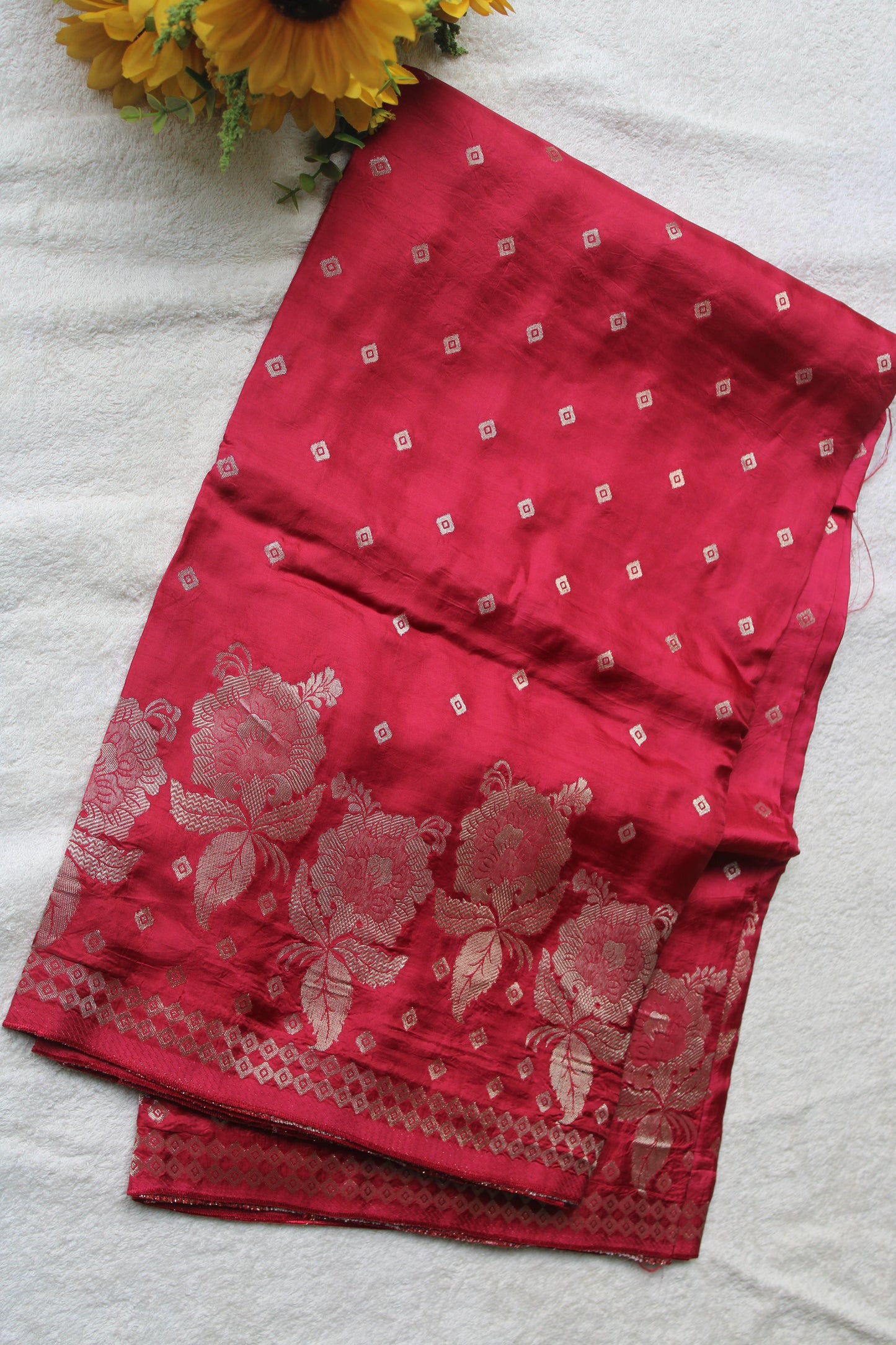 Tomato red Pure crape silk saree with rose flower border