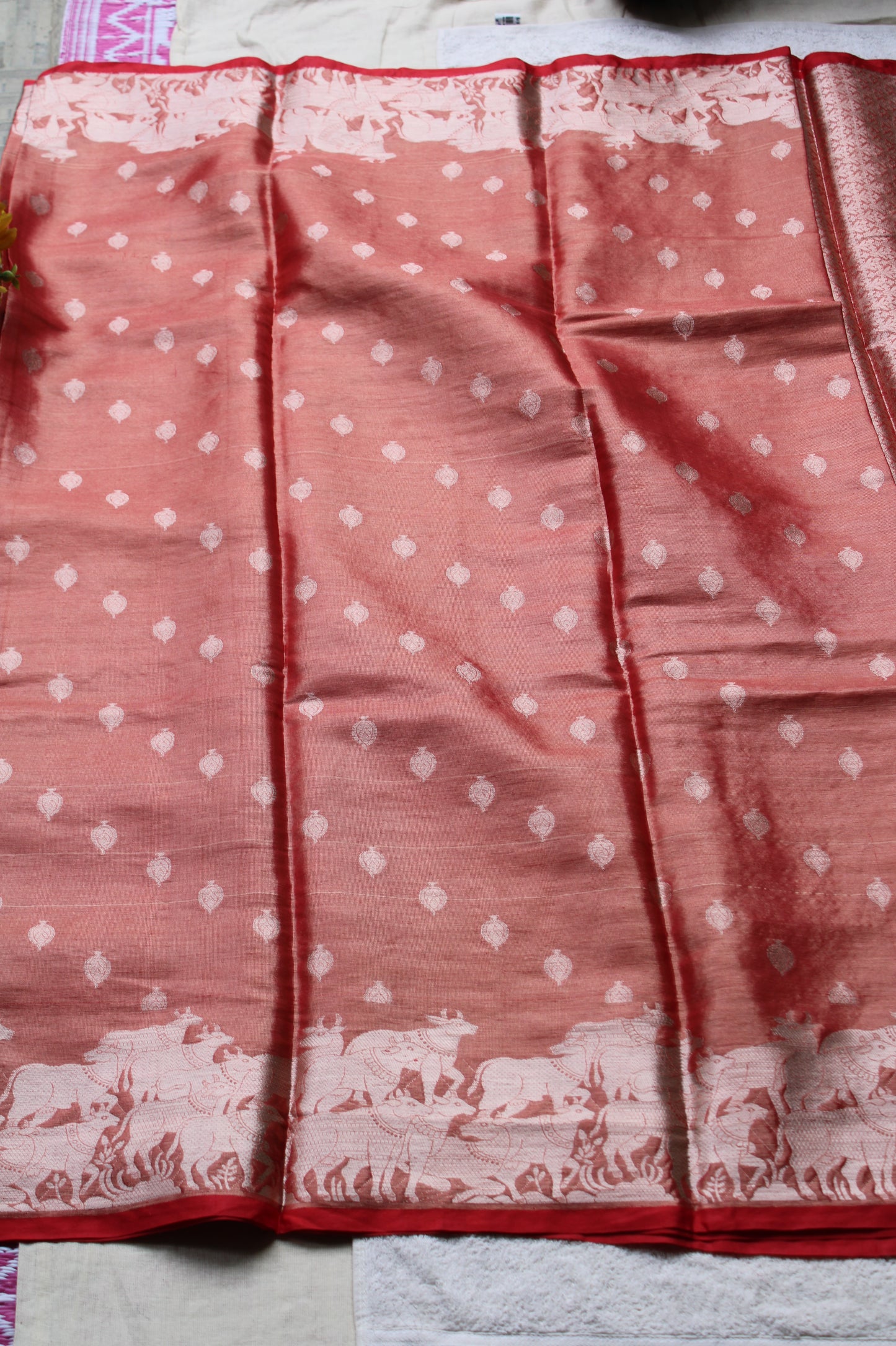 Red Banarasi tissue saree with pichwai border