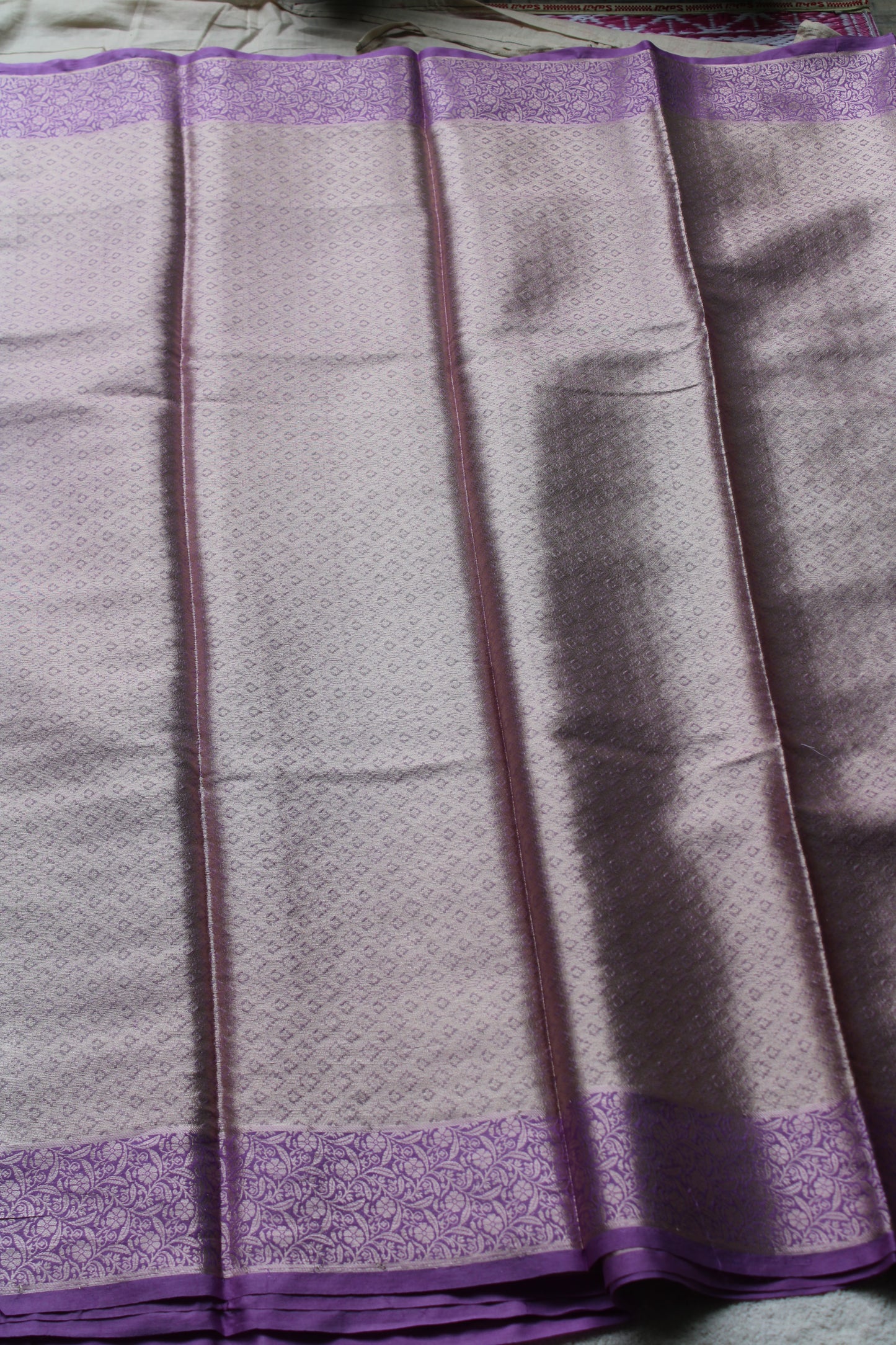 Lavender Banarasi tissue saree with trending flower border