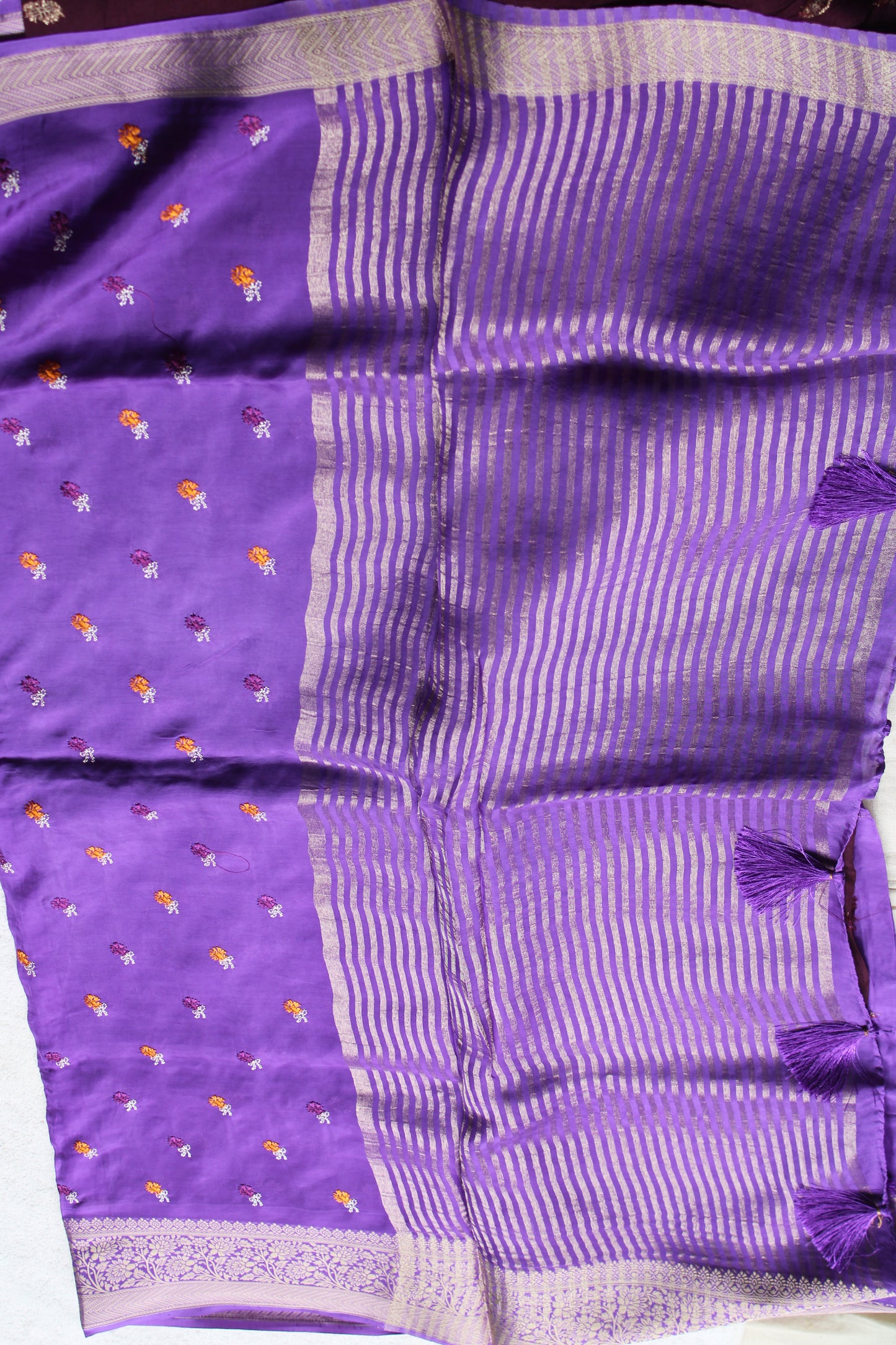 Purple crapesilk Saree with flower embroidery design