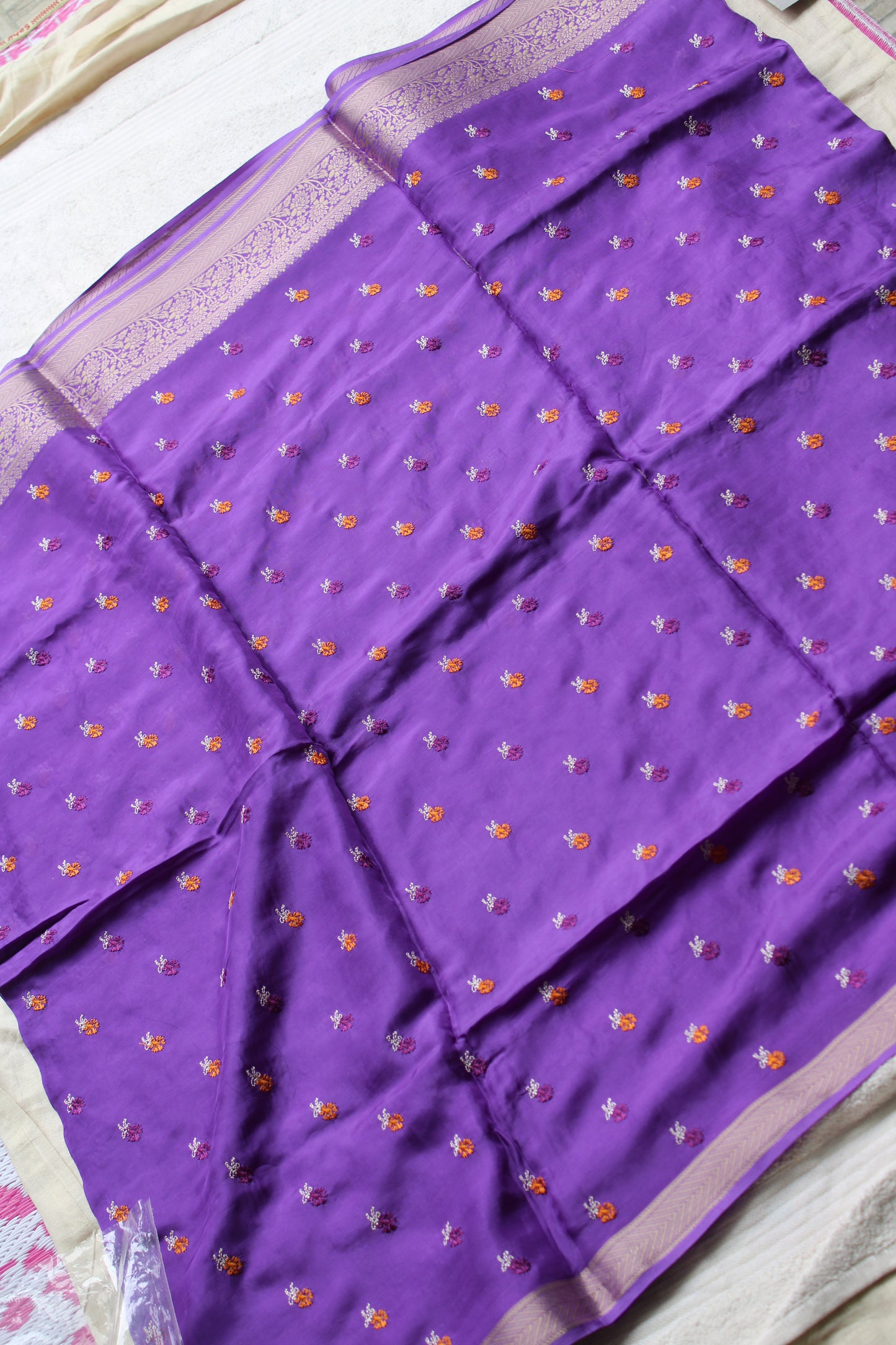 Purple crapesilk Saree with flower embroidery design