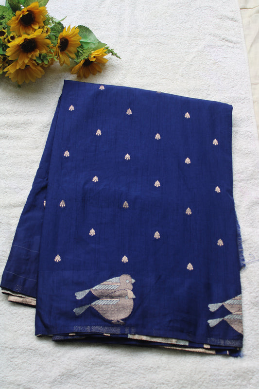 Blue Mona silk saree with figure motifs and open border