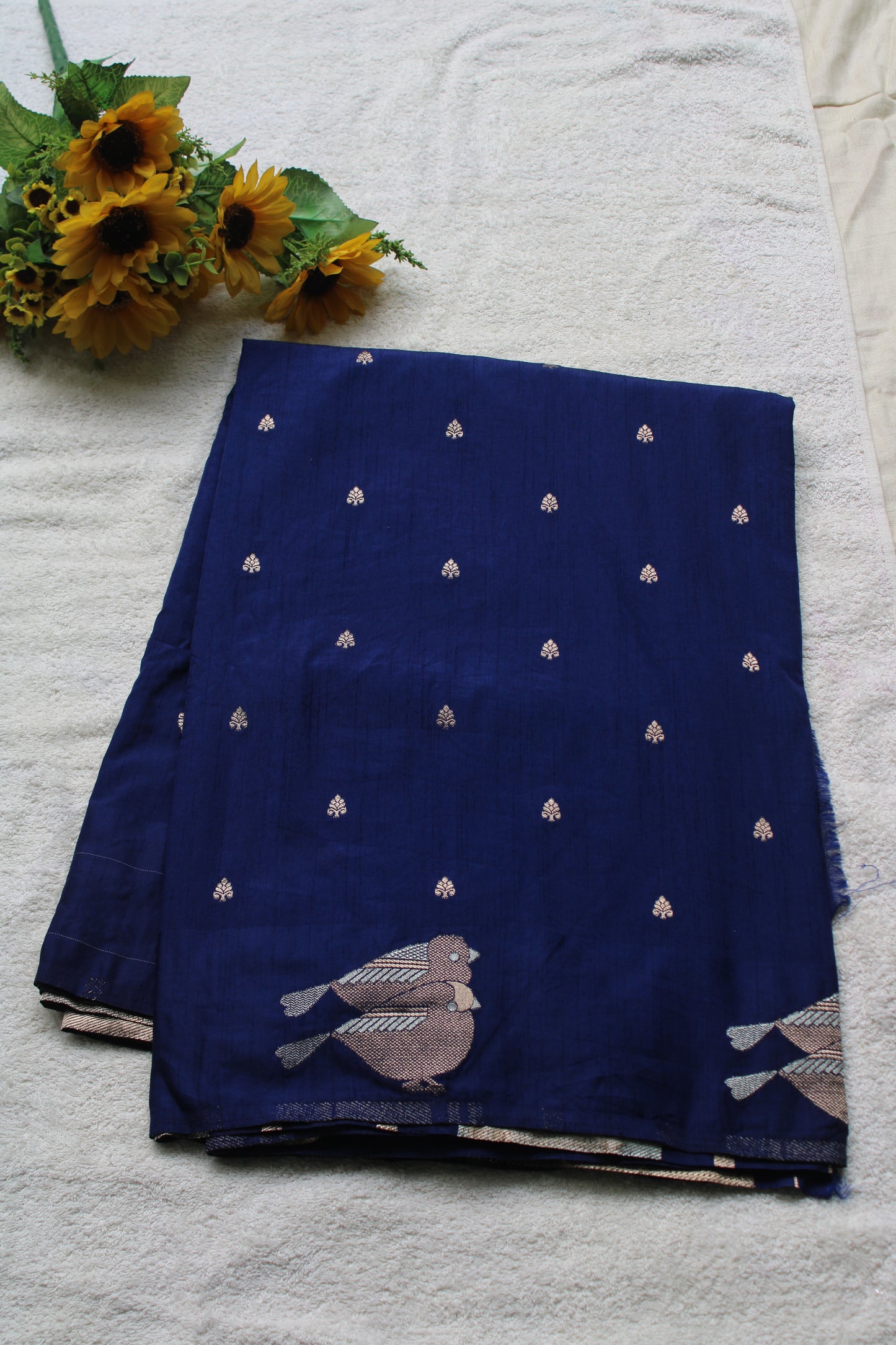Blue Mona silk saree with figure motifs and open border