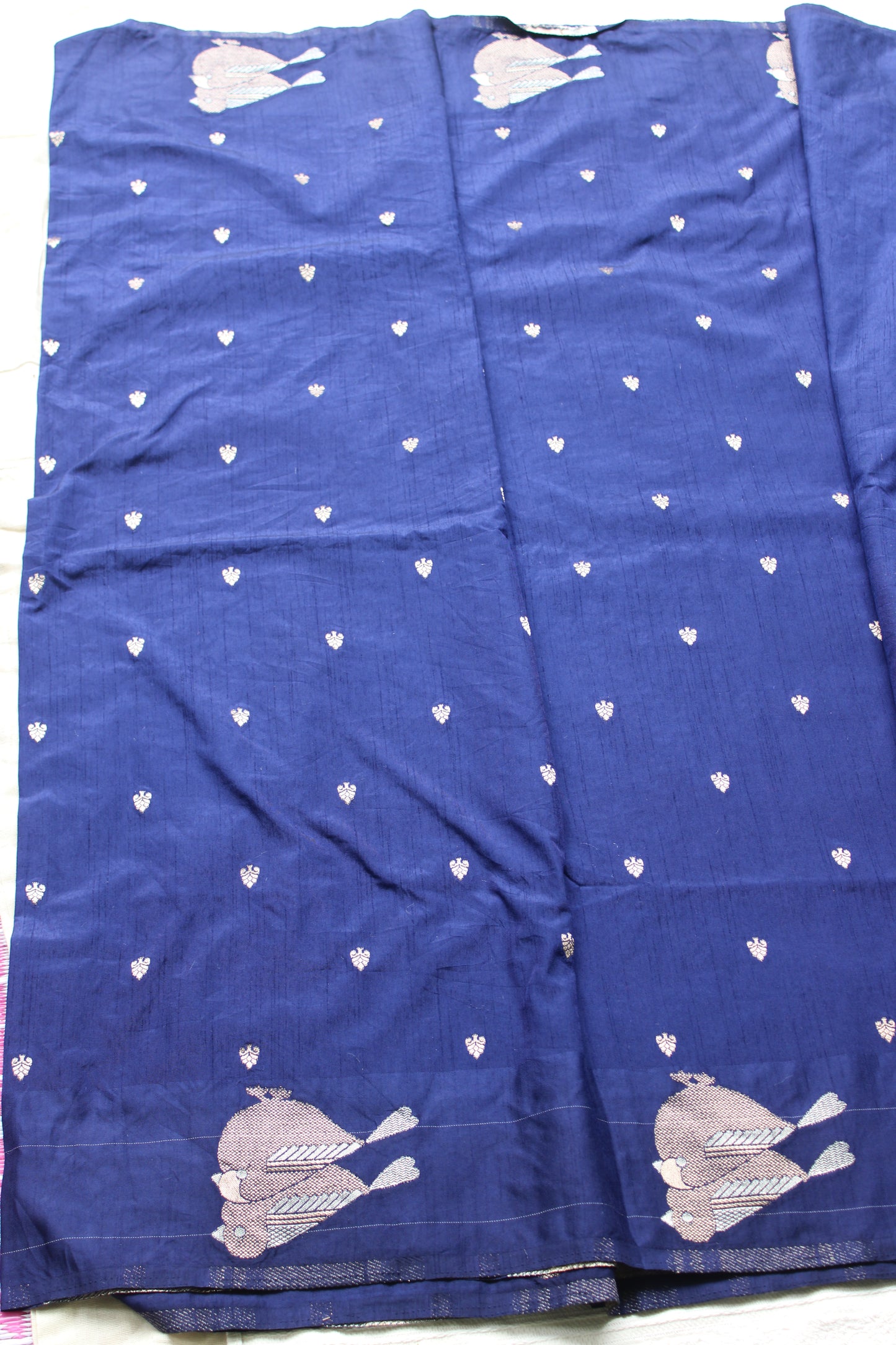 Blue Mona silk saree with figure motifs and open border