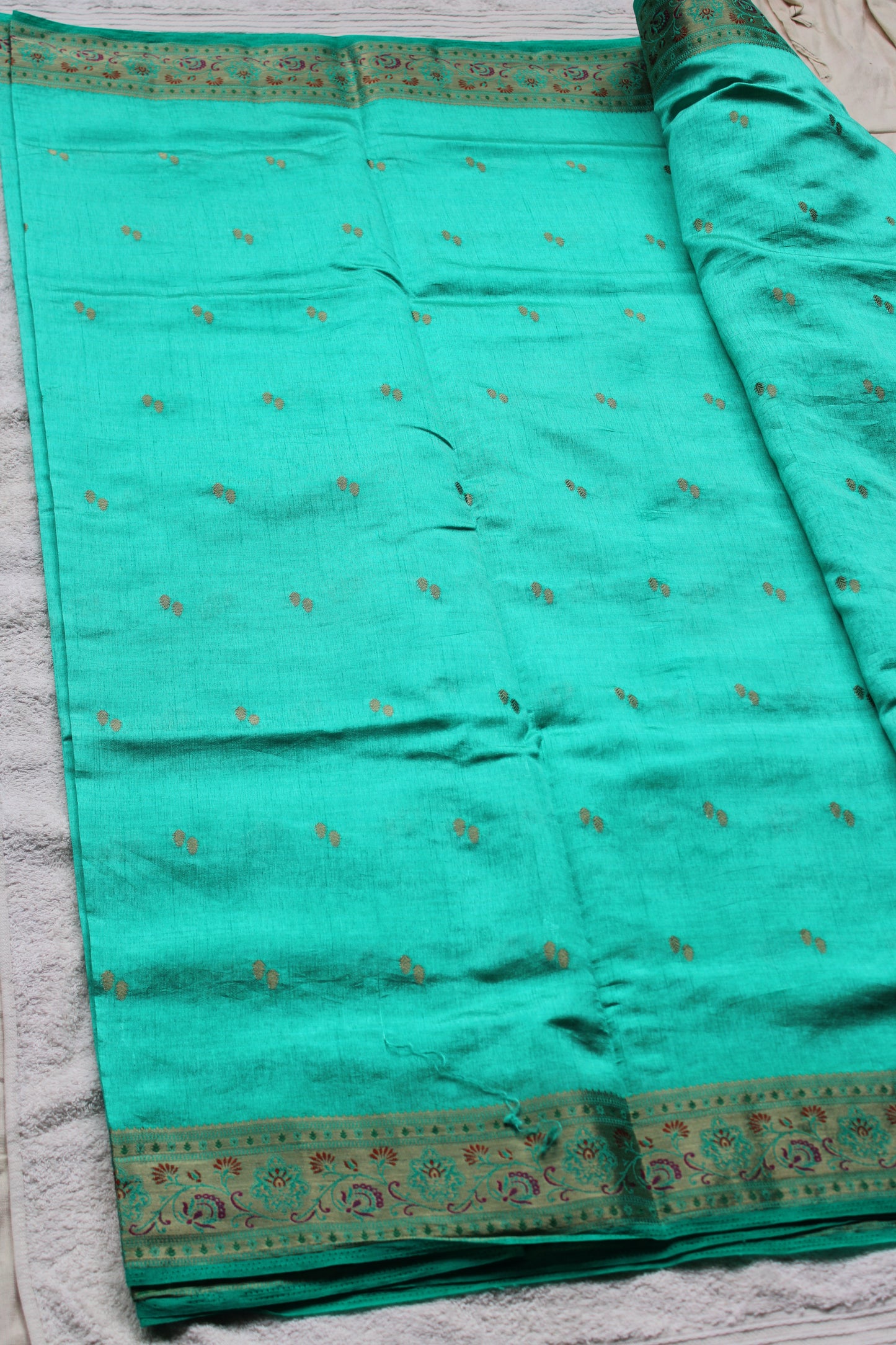 Turquois blue Tusser silk saree with small border
