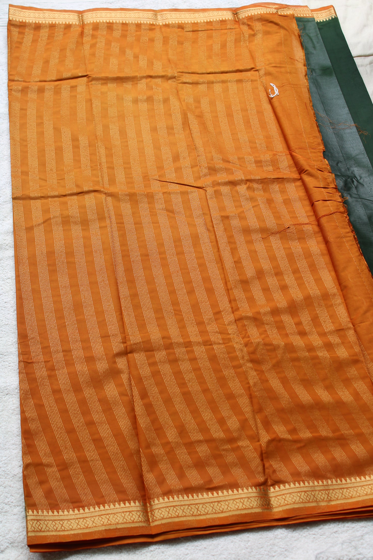 Dark green Premium Mysore silk saree with Small traditional border with contrast blouse
