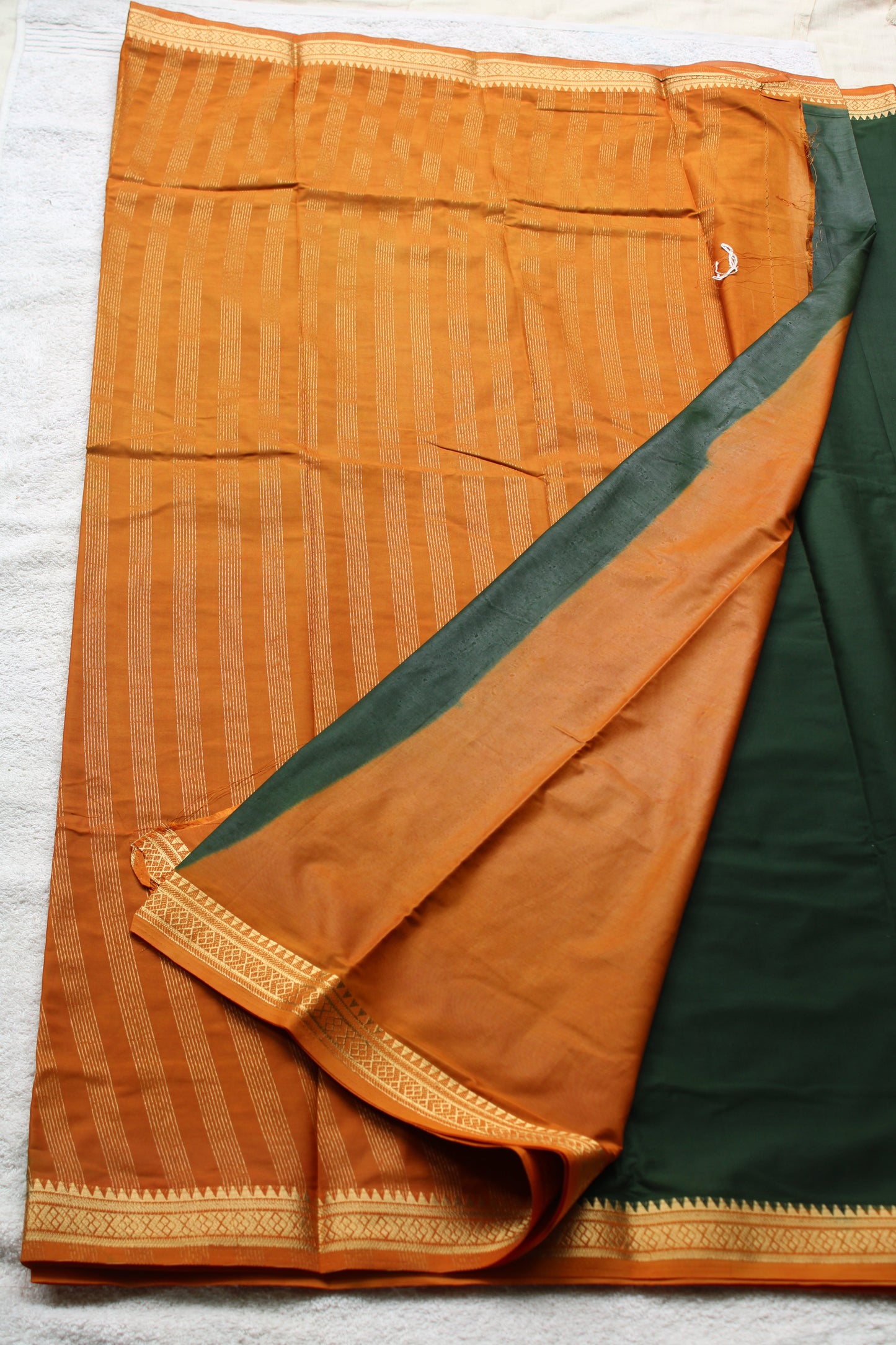 Dark green Premium Mysore silk saree with Small traditional border with contrast blouse