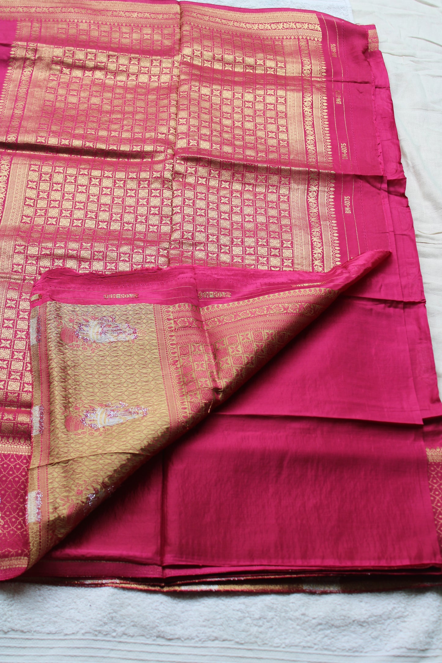 Pink Banarasi Russian crape saree with checked and floral border