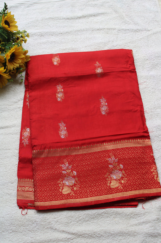 Orange Banarasi Russian crape saree with checked and floral border