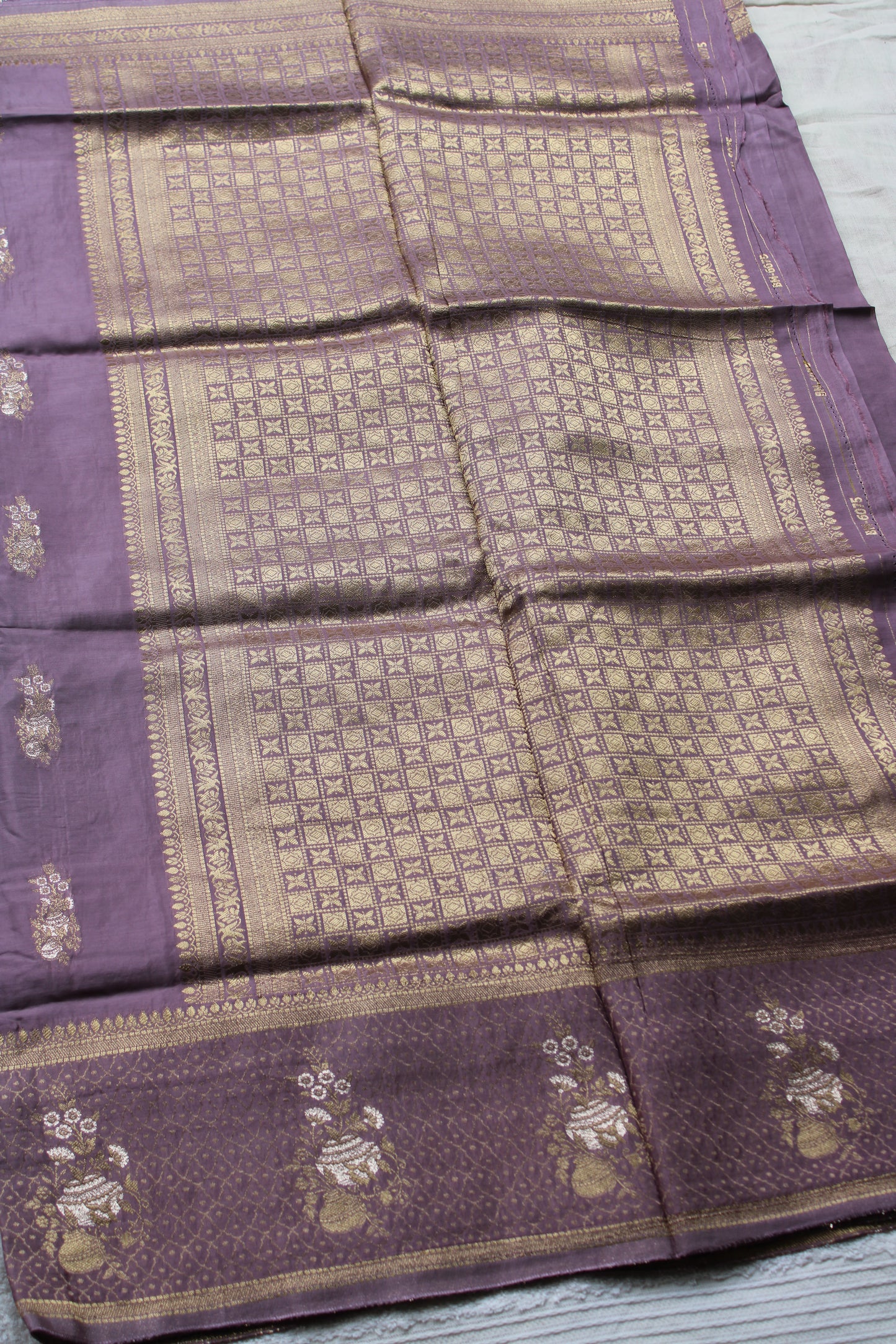 Onion Pink Banarasi Russian crape saree with checked and floral border