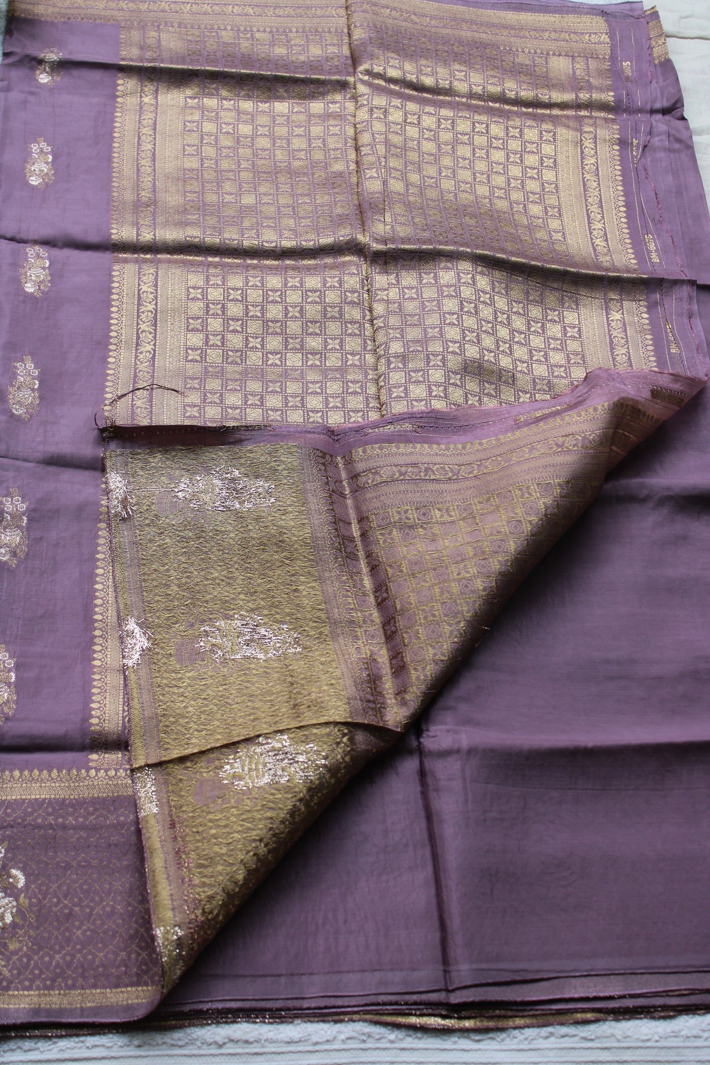Onion Pink Banarasi Russian crape saree with checked and floral border