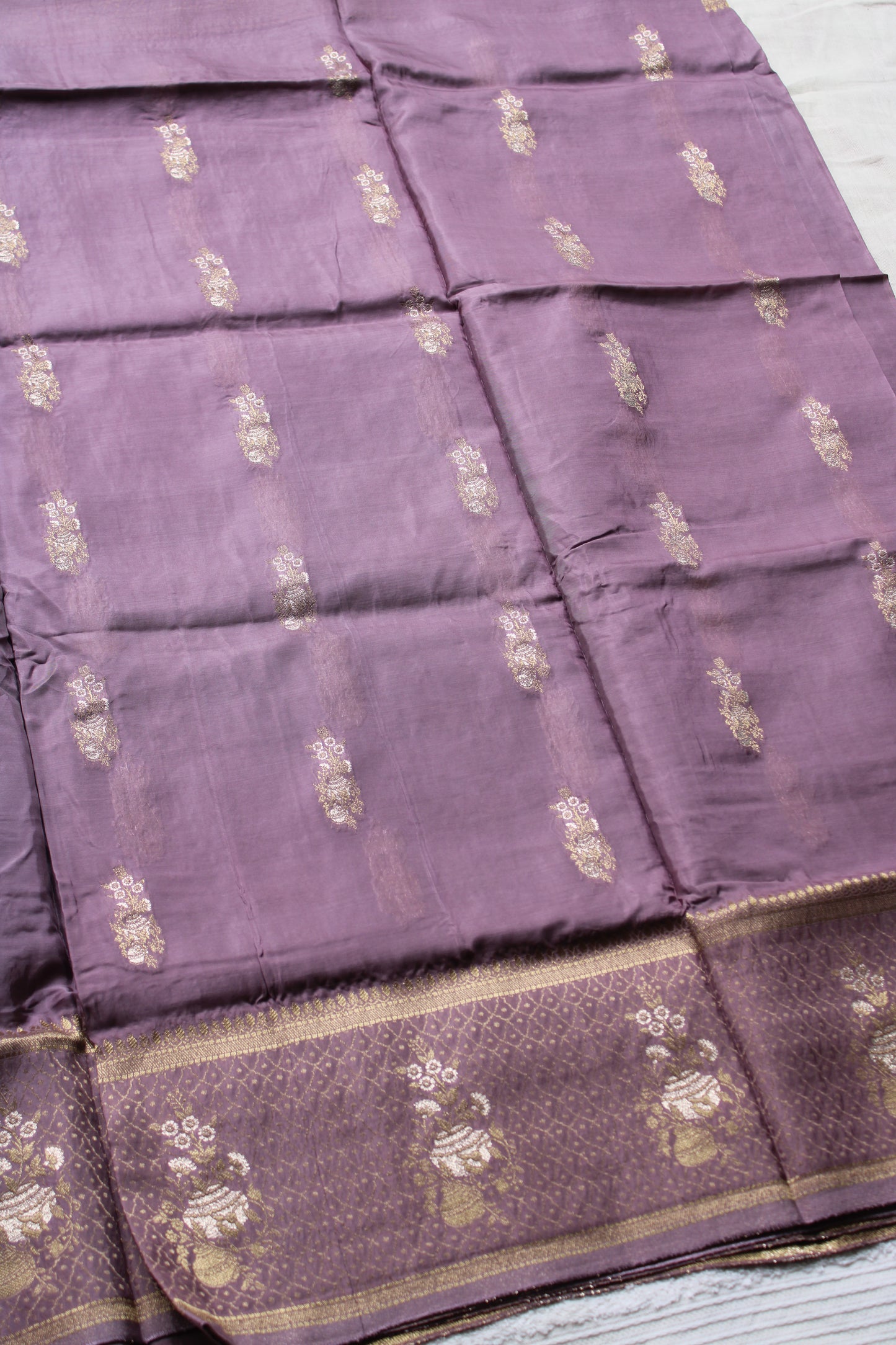 Onion Pink Banarasi Russian crape saree with checked and floral border