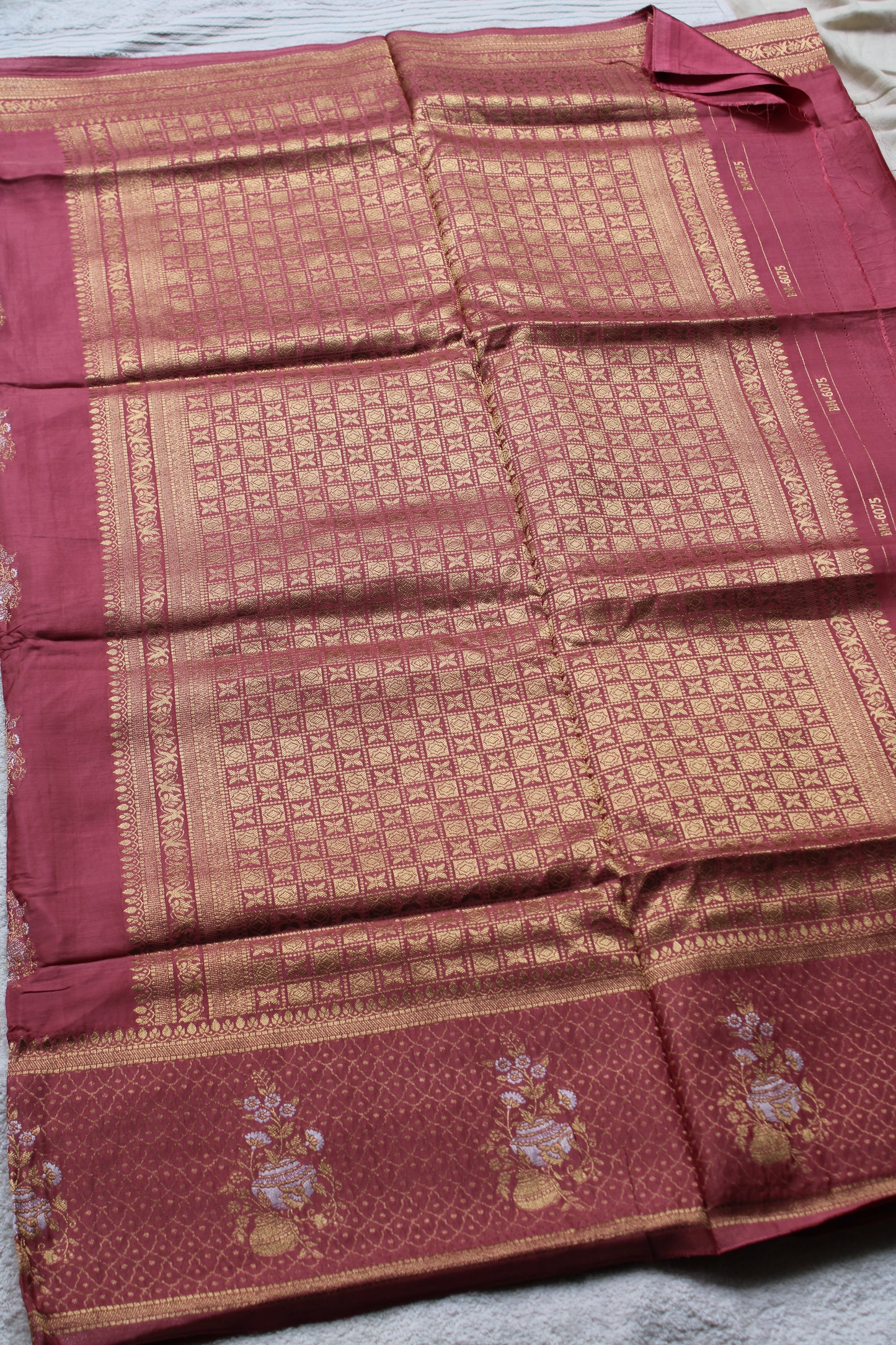 Pink Banarasi Russian crape saree with checked and floral border