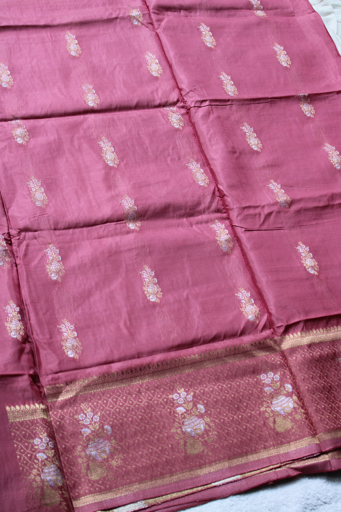 Pink Banarasi Russian crape saree with checked and floral border